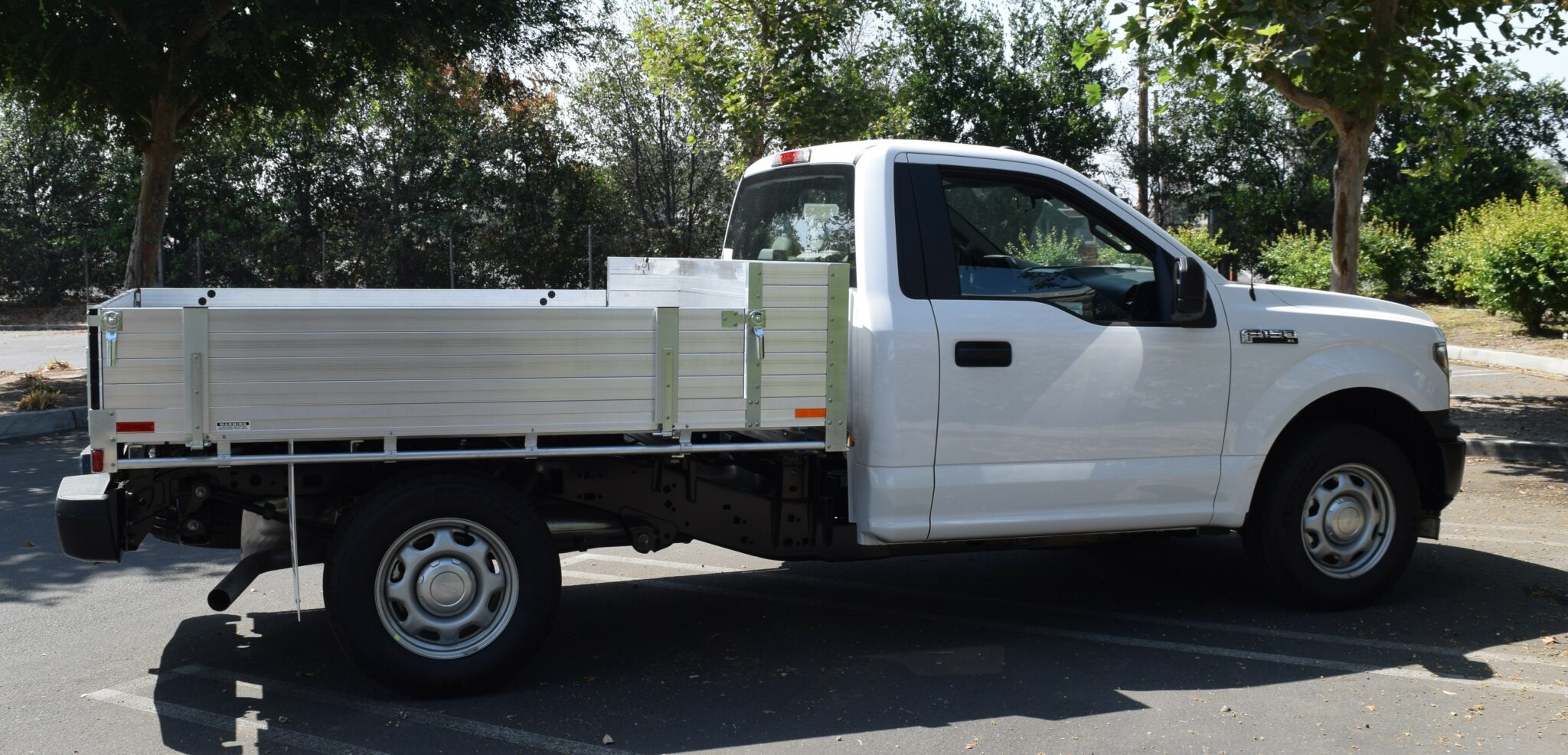 2018 F150 with an 81"×8' AlumBody pool truck bed, 12" solid fold-down gates