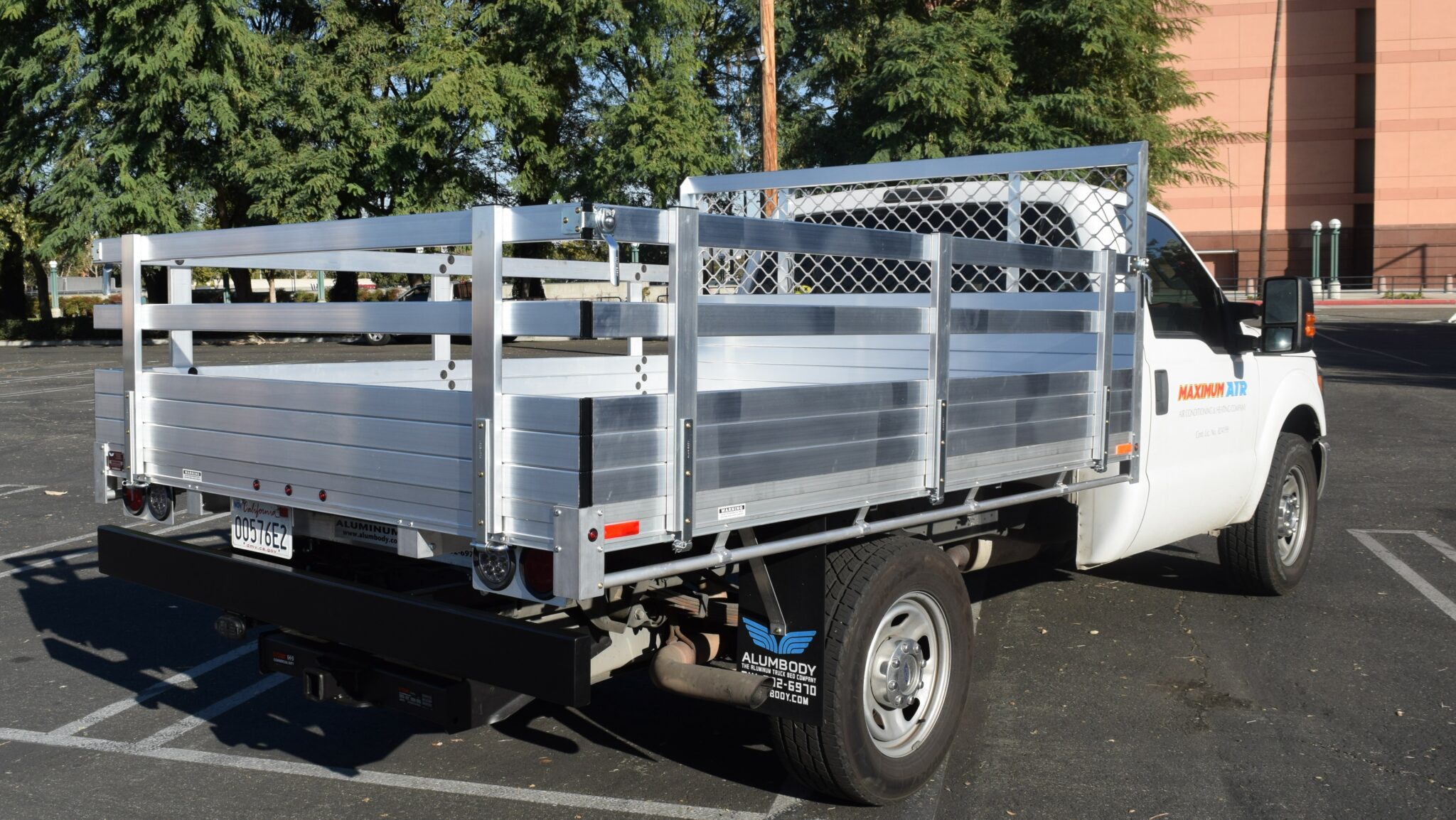 2012 Ford F350 7X96 aluminum flat bed with 25 fold down gates and dock bumper