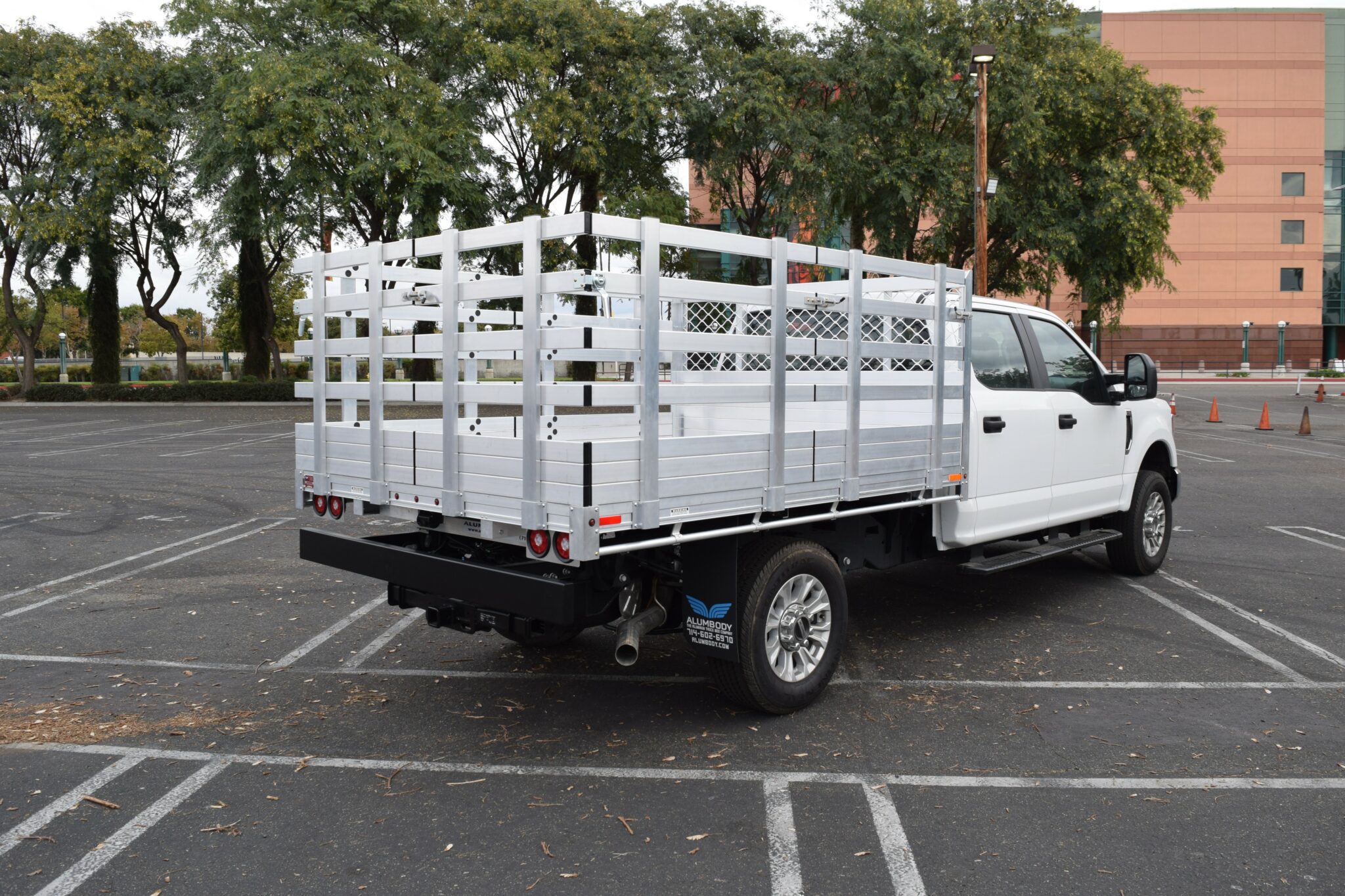 2021 F250 with a 7 x 9 Aluminum Bed with 41 Lift Out Stakes Hitch and dock Bumper