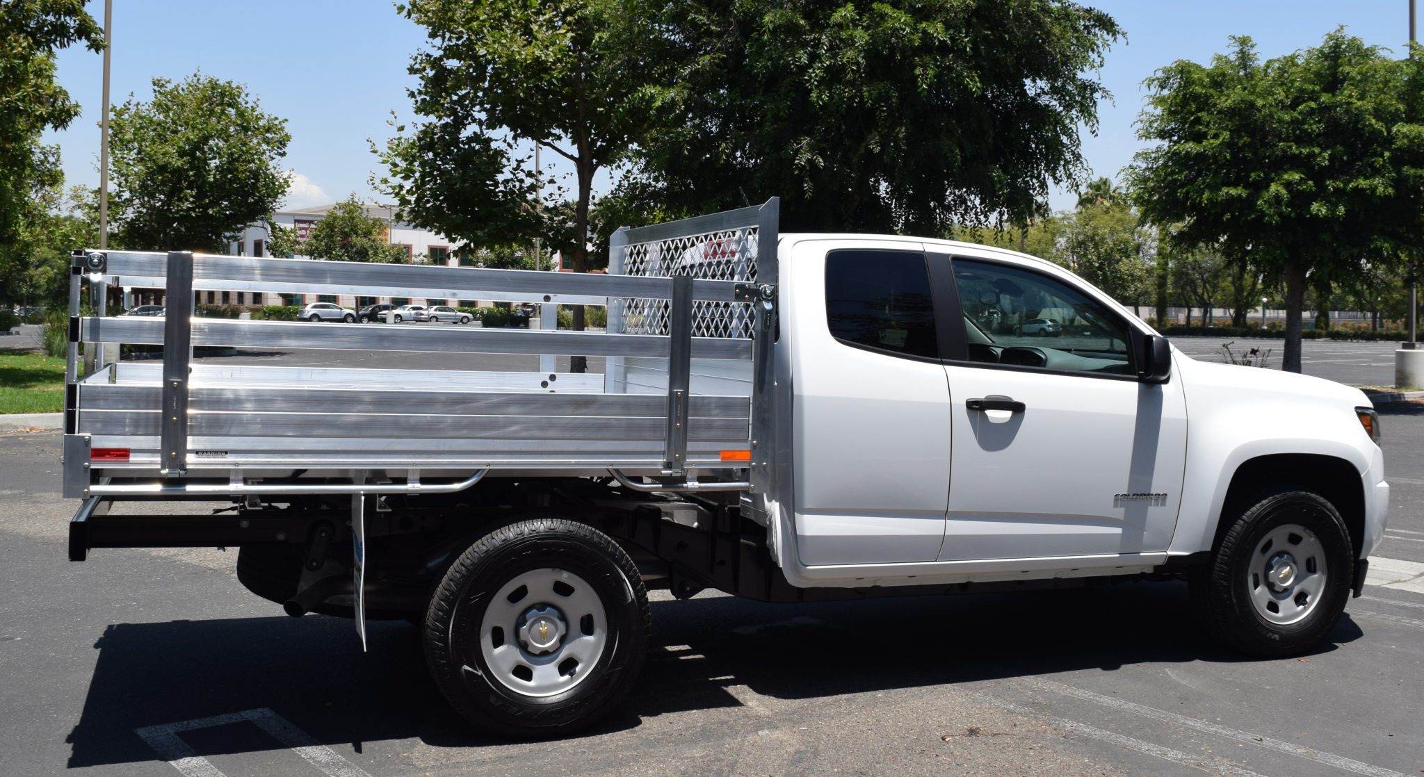 2018 Chevy Colorado with a 6' X 7' AlumBody aluminum flat bed with 22" fold down gates and dock bumper