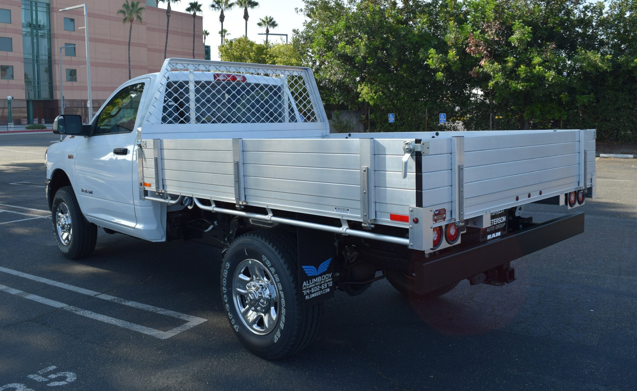 2021 Ram 2500 SRW 7'x9' aluminum flatbed with a tapered headboard solid fold down gates dock bumper hitch