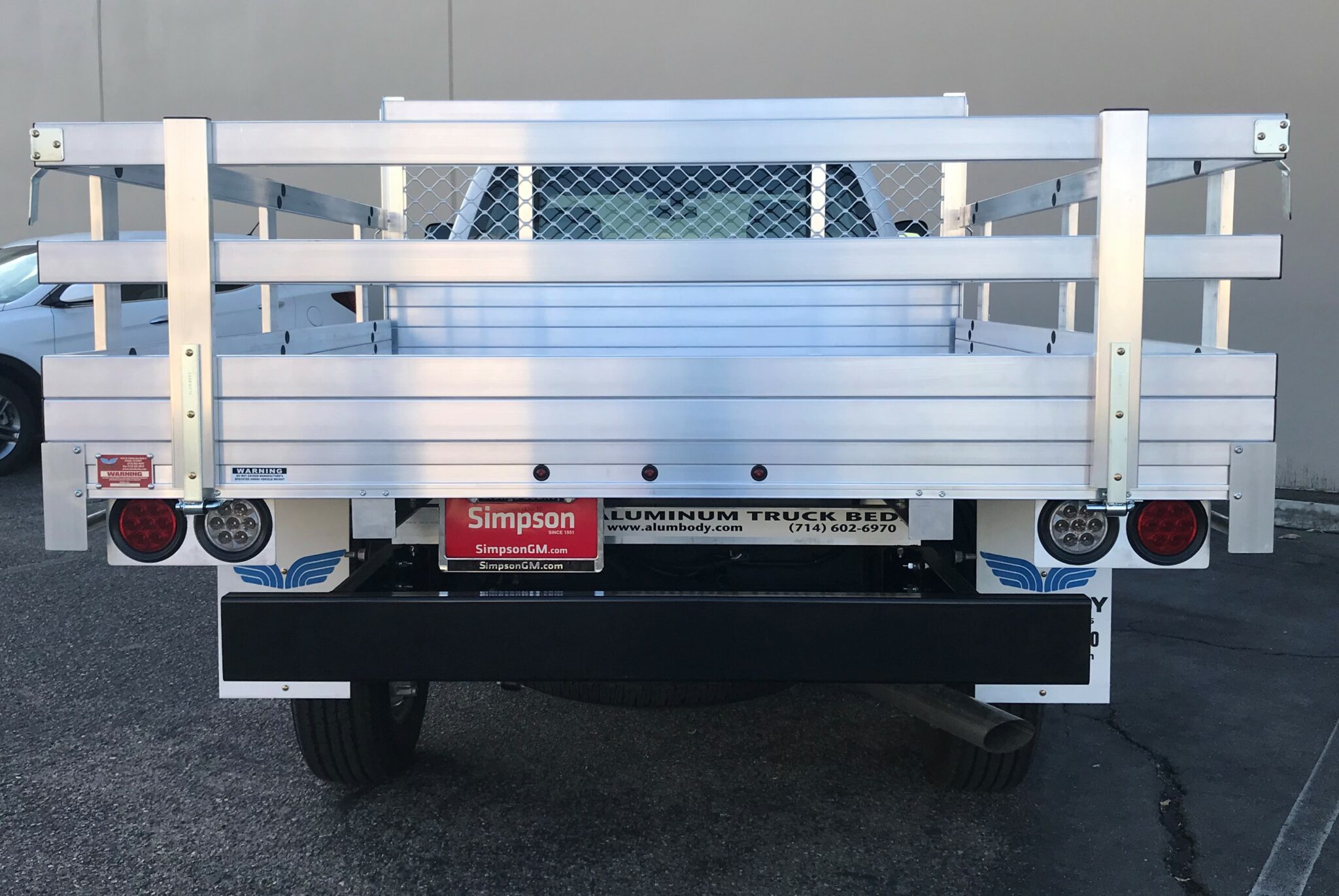 2018 Chevy 2500 7 X 9 Aluminum Stake Bed with 22 Fold Down Gates using a Dock Bumper.