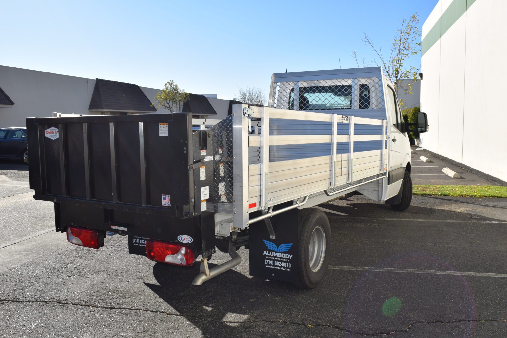 2004 MB Sprinter 3500 6'6''x13'6'' 25'' fold down sides Taper Headboard and Lift Gate in the rear