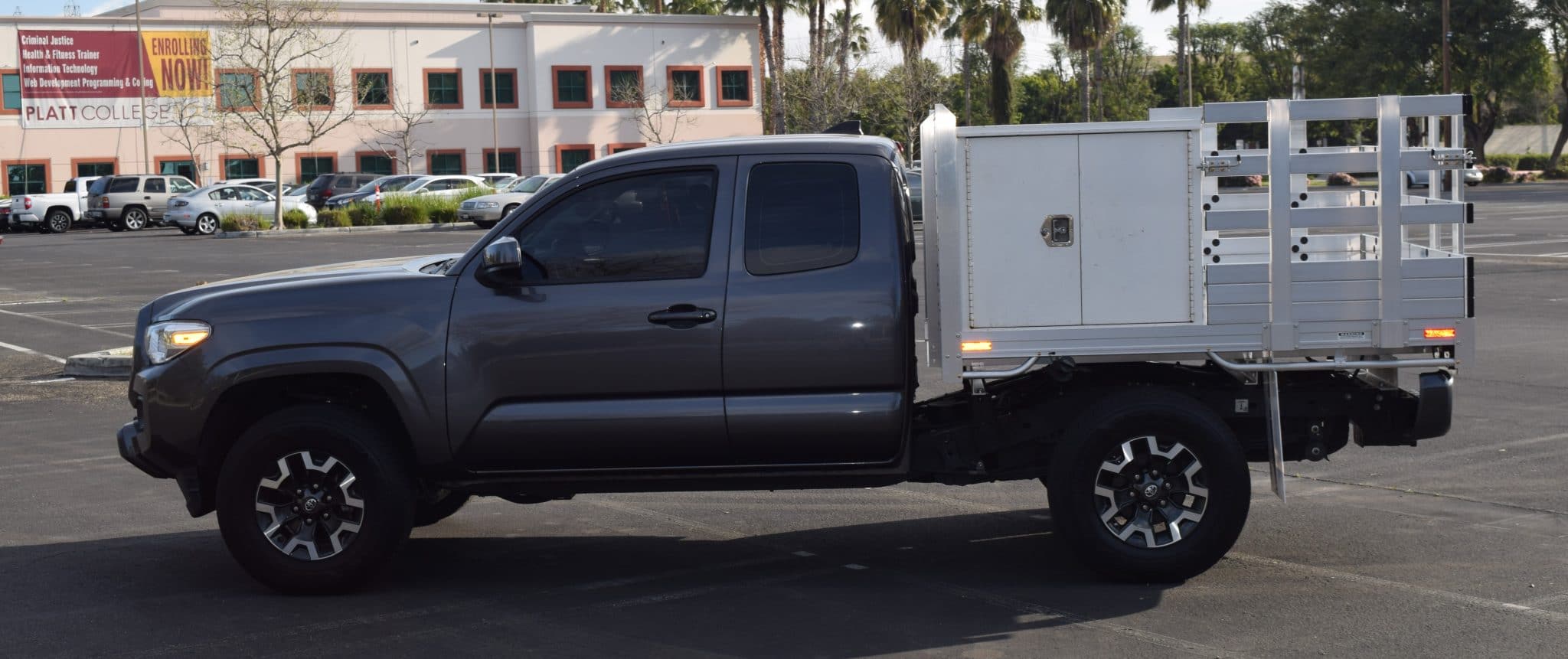 2021 Toyota Tundra 6'6" x 9', aluminum stake bed, 38" lift-out sides with handles, barn doors in the rear, 2-step dock bumper