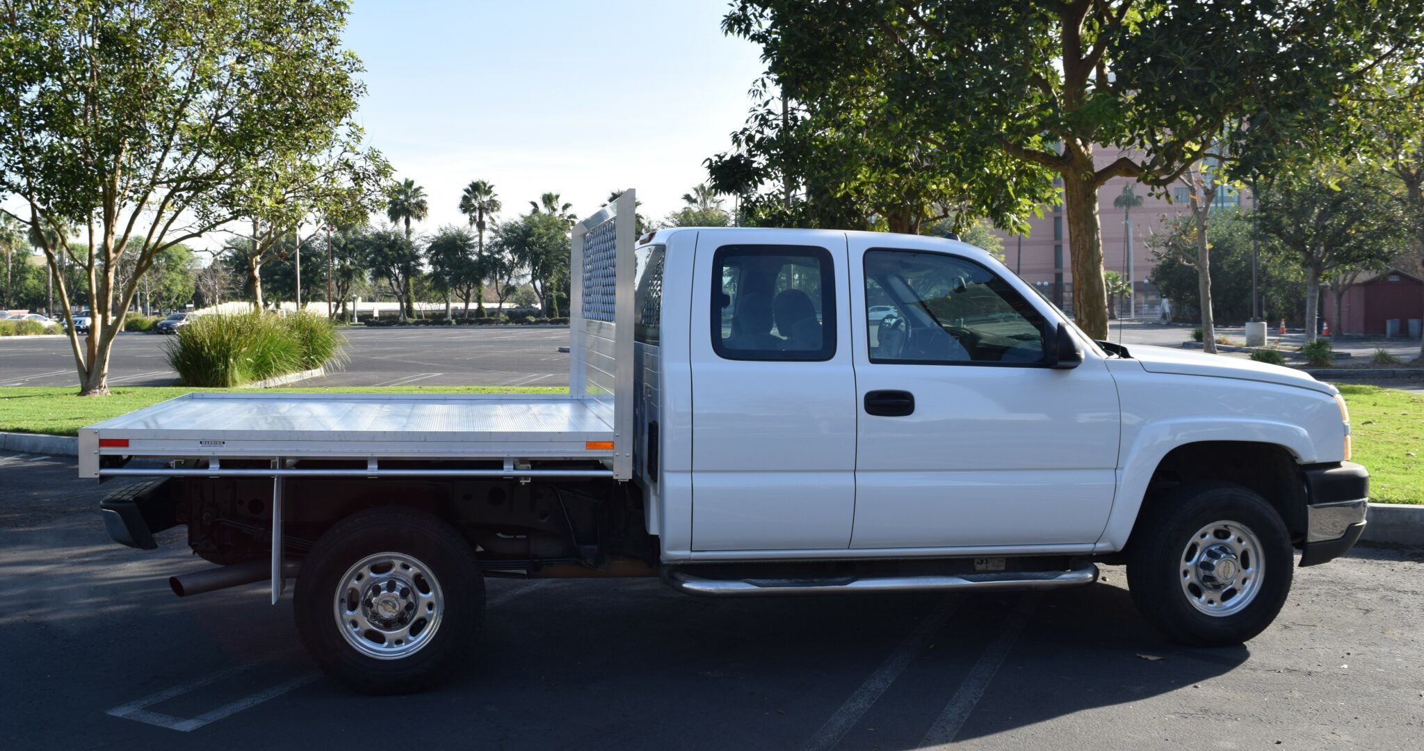 2003 Chevy 2500 66 X 7 Aluminum Flat Bed using the Factory Bumper.