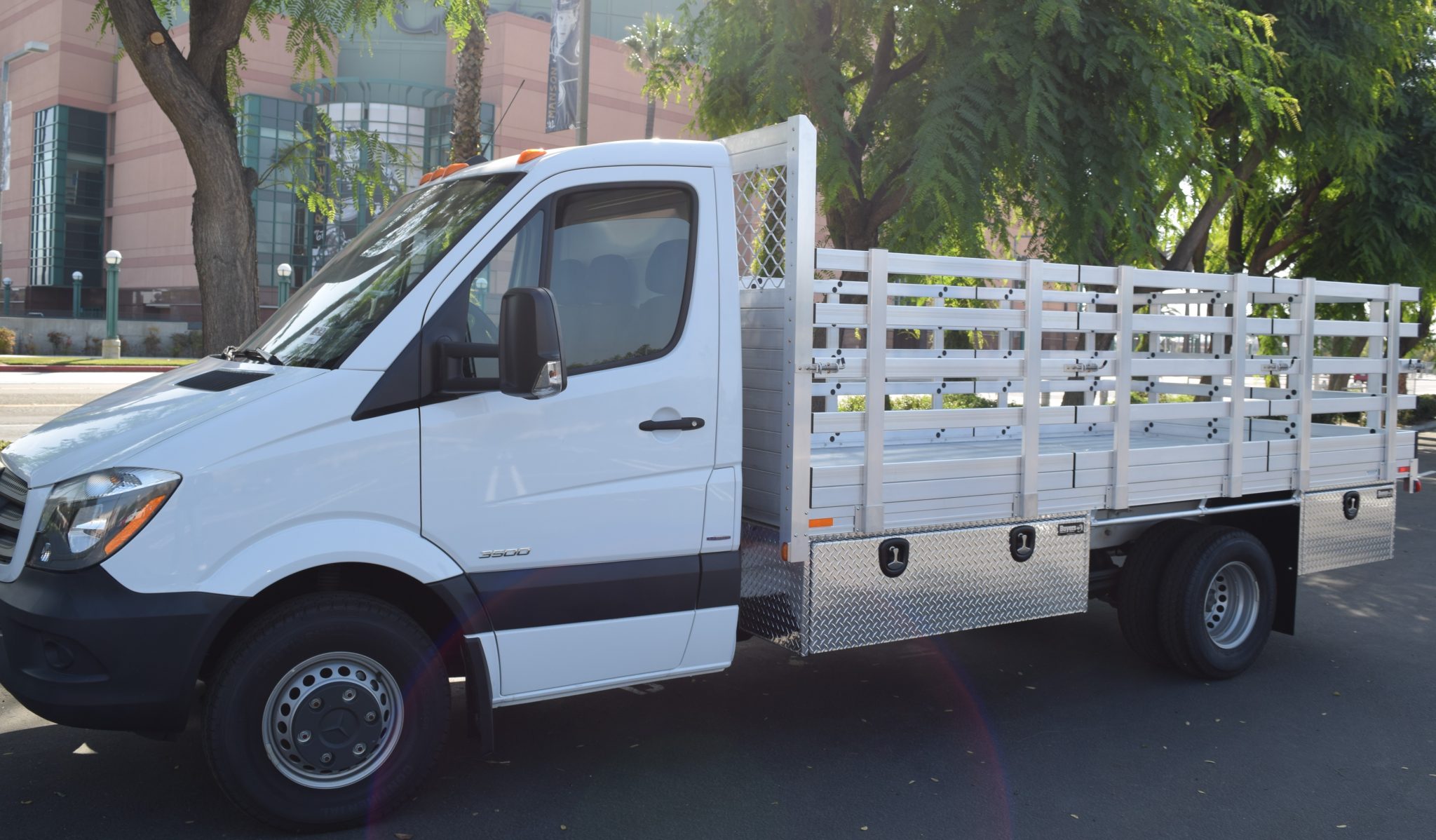 2016 Mercedes-Benz Sprinter 3500 Dual Rear Wheel with a 7' X 14' AlumBody aluminum stake bed with 38" lift out stakes, 4 underbody tool boxes, and dock bumper
