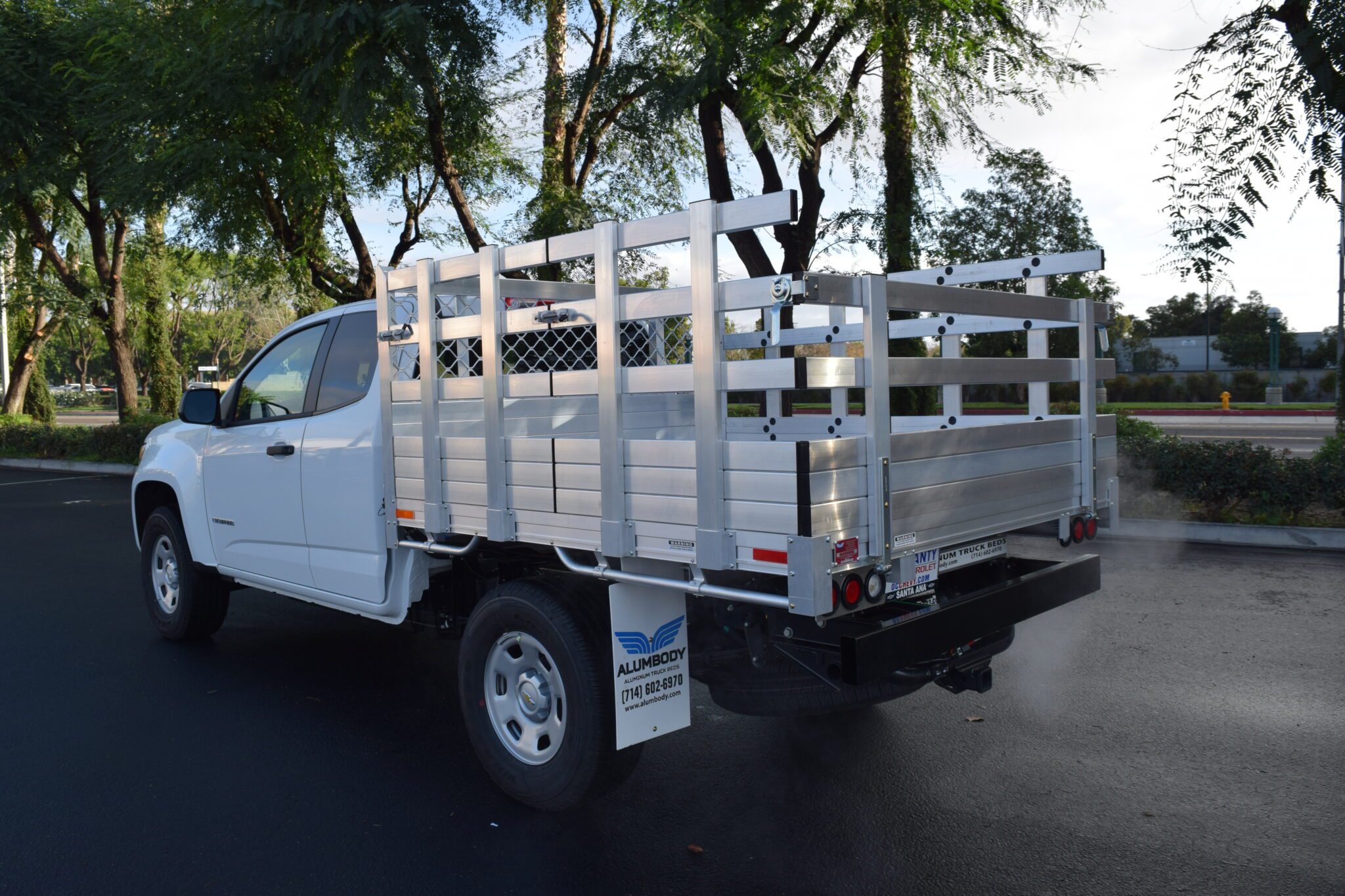 2018 Chevy 2500 66 X 9 Aluminum Stake Bed with 38 Lift Out Sides 22 Rear Fold Down Gates using the Factory Bumper Corner View.