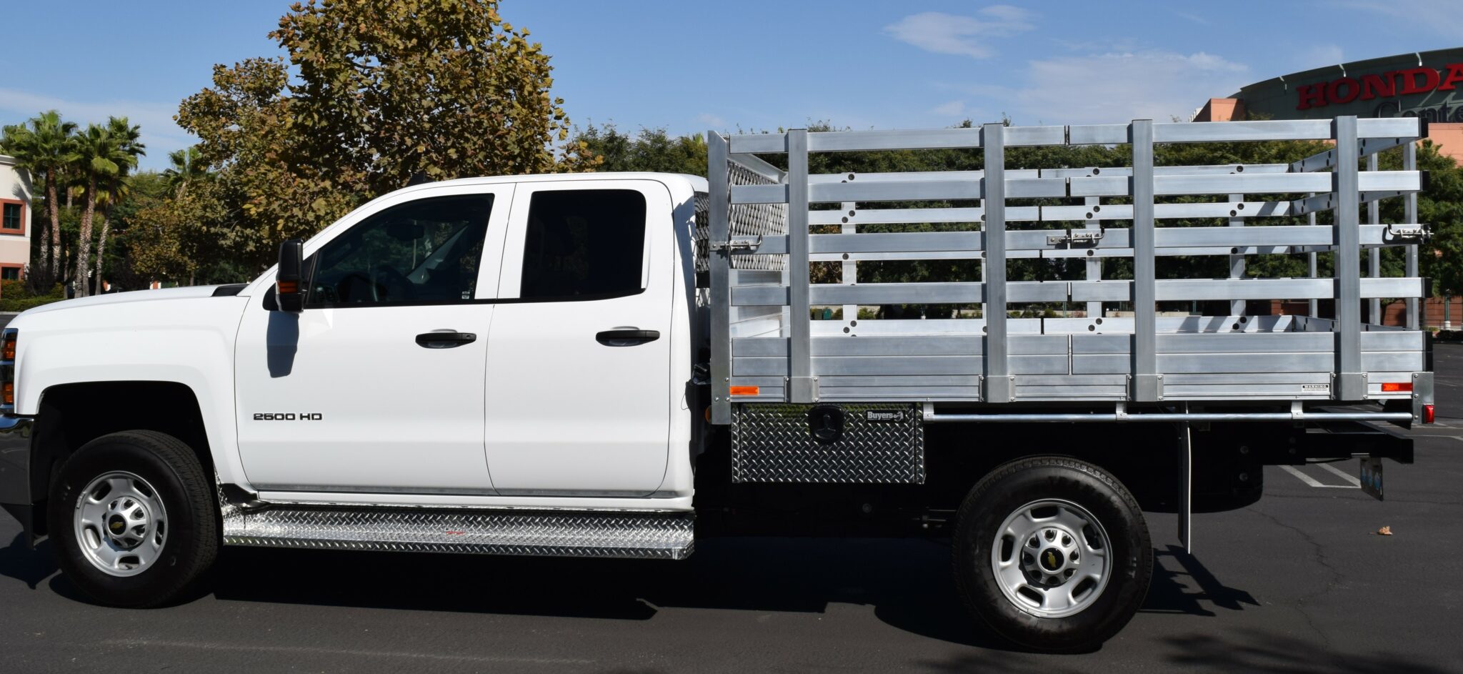 2016 Chevy 2500 7 X 9 aluminum stake bed with custom 38lift out stakes using a dock bumper and 2 underbody tool boxes 14x12x30.