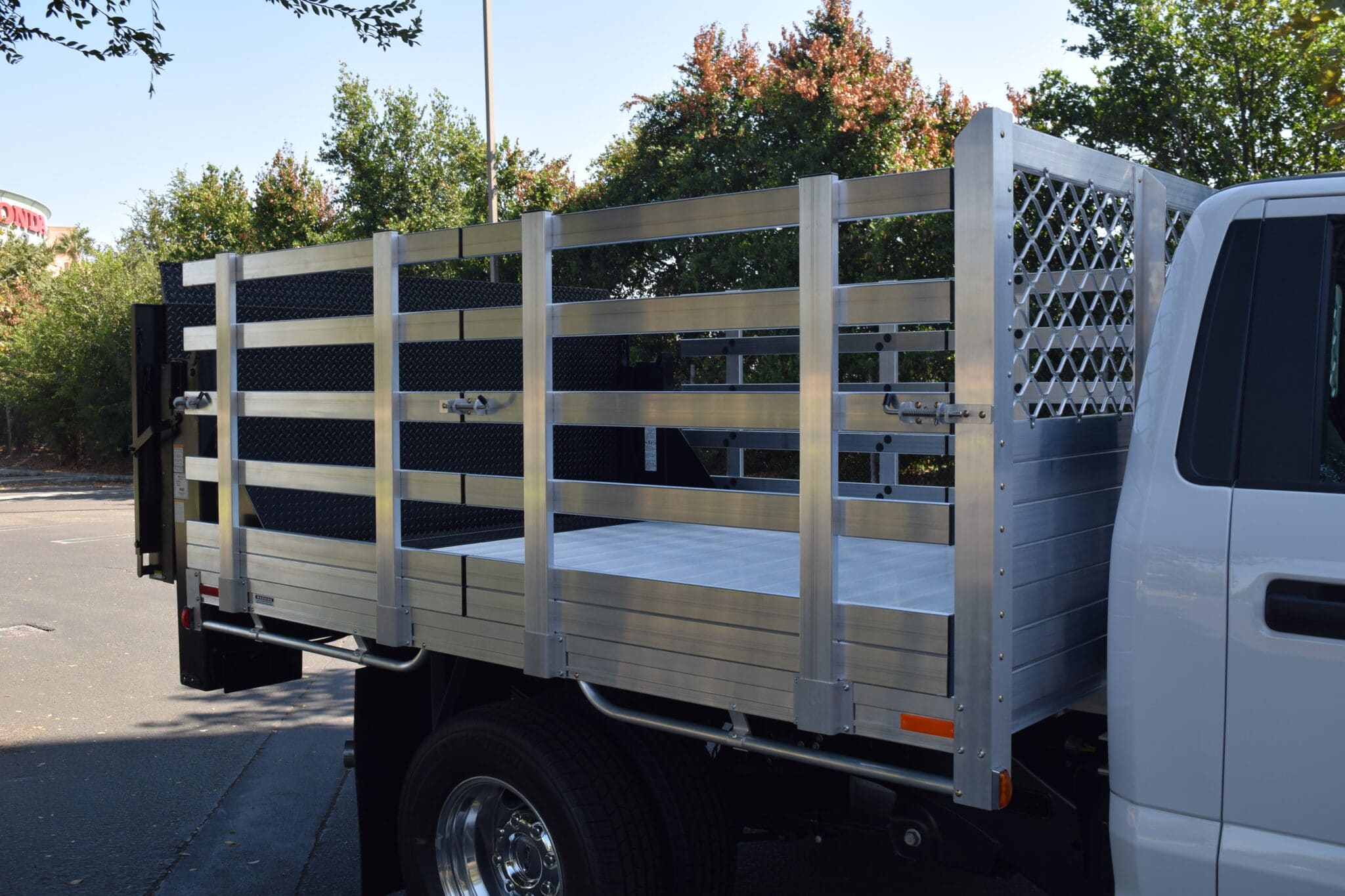 2019 Ford F350 8X9 aluminum flat bed with 38 lift out sides gates and lift gate in the rear