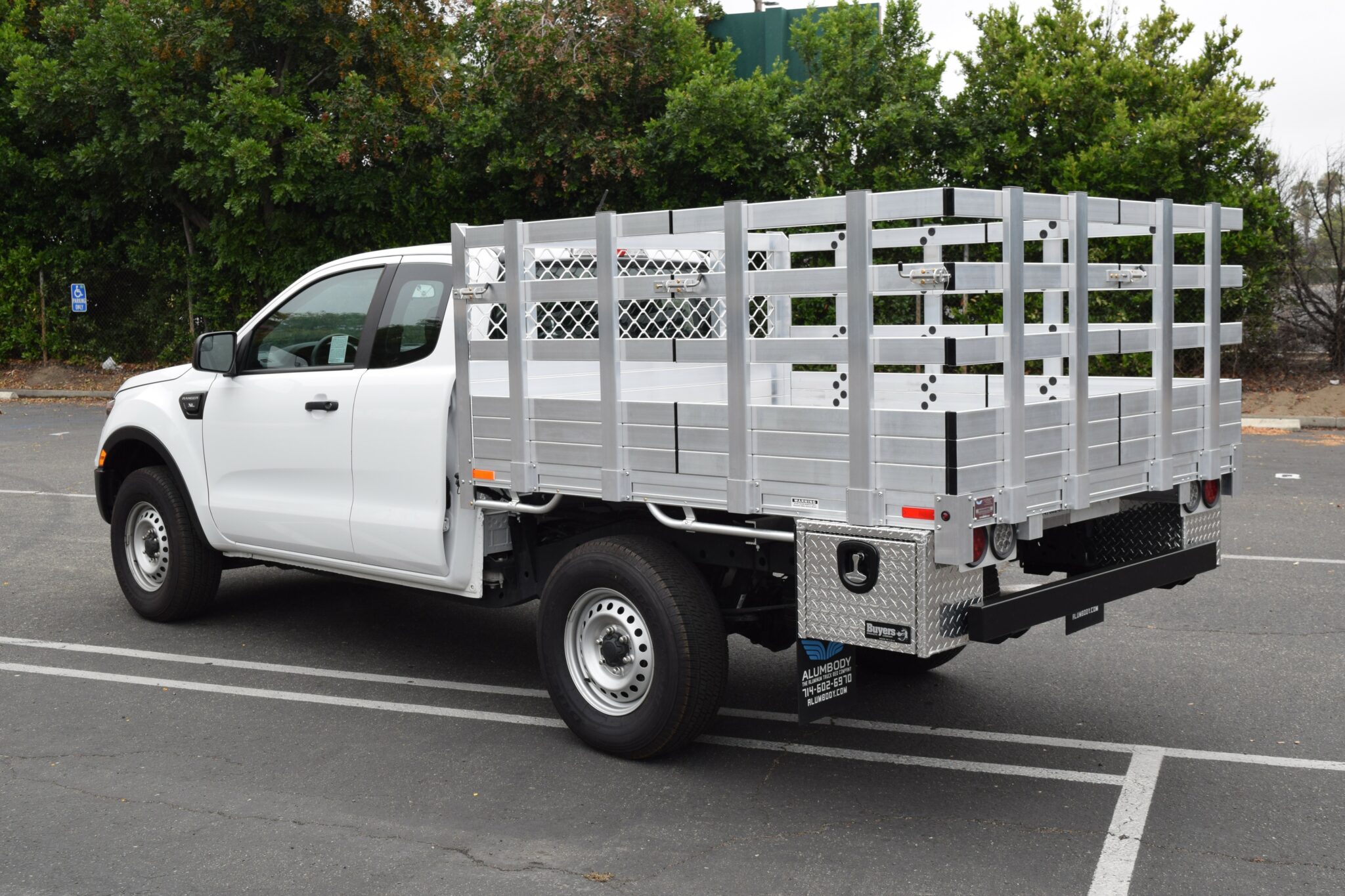 2019 Ford Ranger 6’x7’ aluminum stake bed with 33″ lift-out stakes, 2 tool boxes 14x12x18, and dock bumper