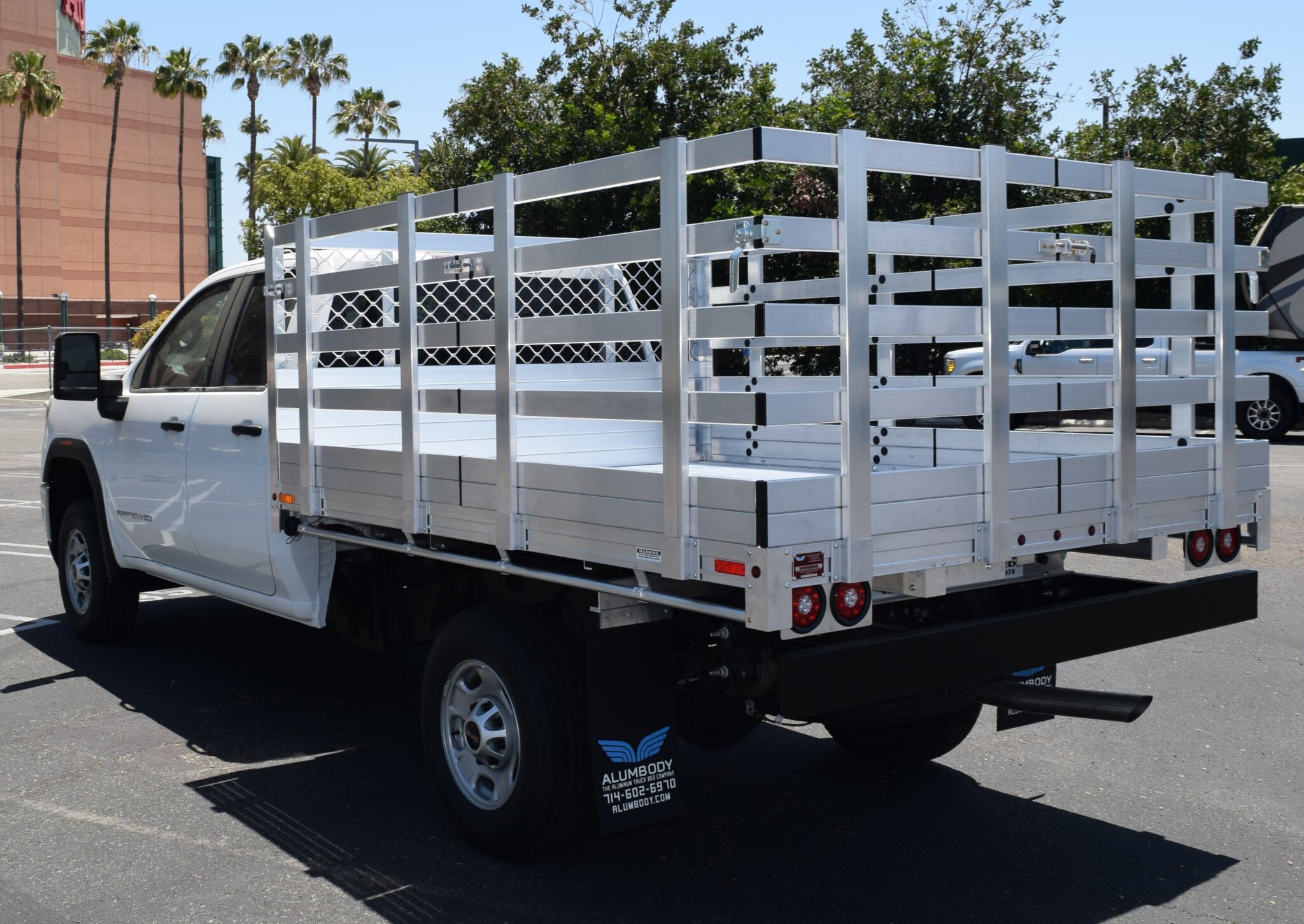 2020 GMC 2500, with a 7'x9' aluminum body, 38'' lift out gates and dock bumper