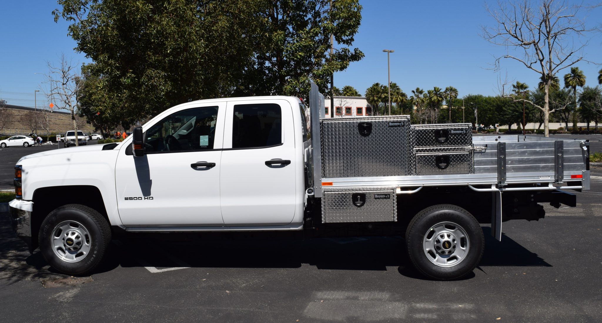 Chevy Silverado 2500 with a 6’6” X 9’ AlumBody aluminum flat bed, 2 topsider tool boxes 24” X 24” X 36” 20” X 18” X 24”, 2 underbody tool boxes 14” X 12” X 30” and dock bumper