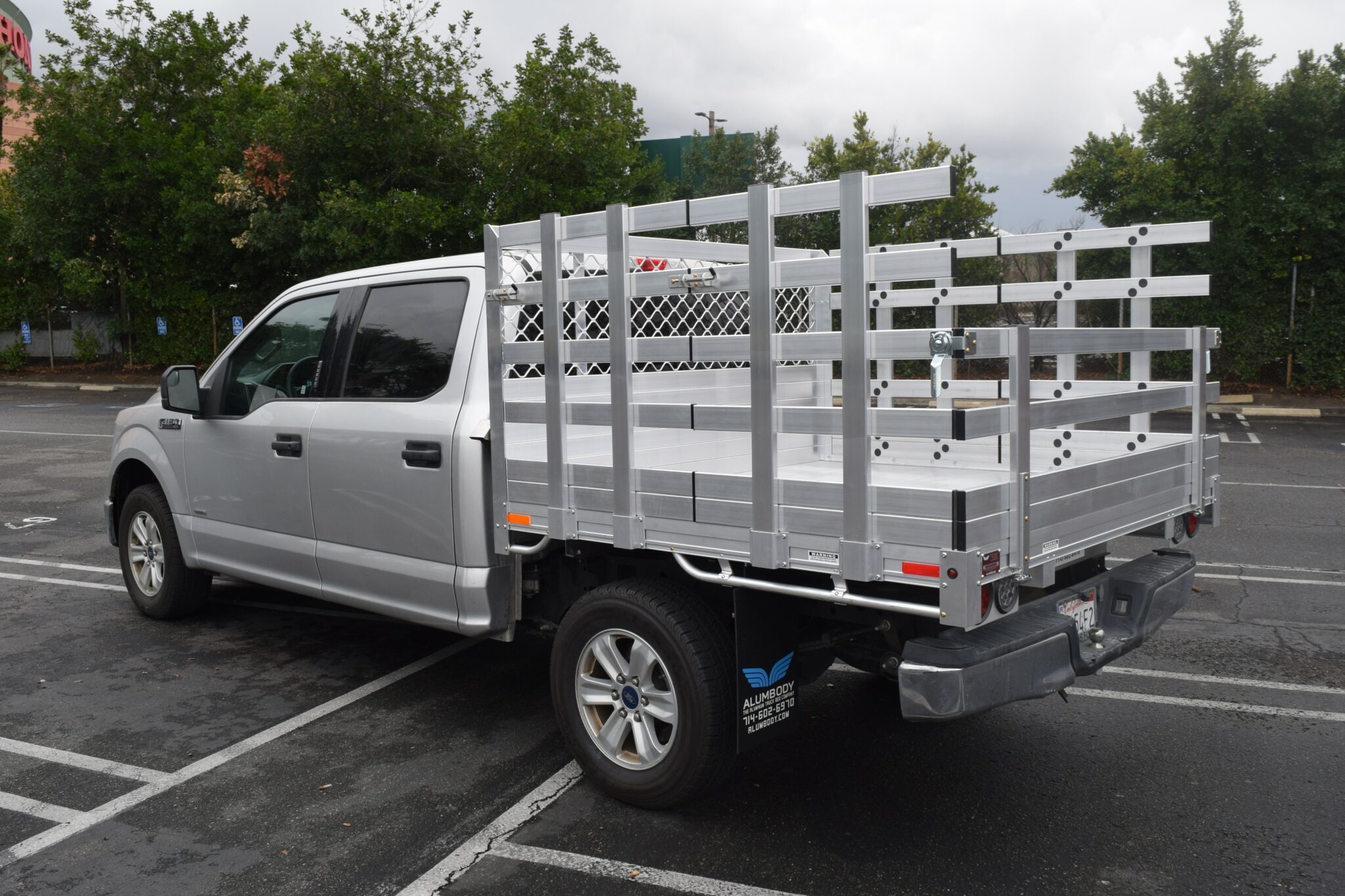 2018 Ford F150 66 X 6 Aluminum Stake Bed with 38 Lift Out Sides 22 fold down rear using the Factory Bumper