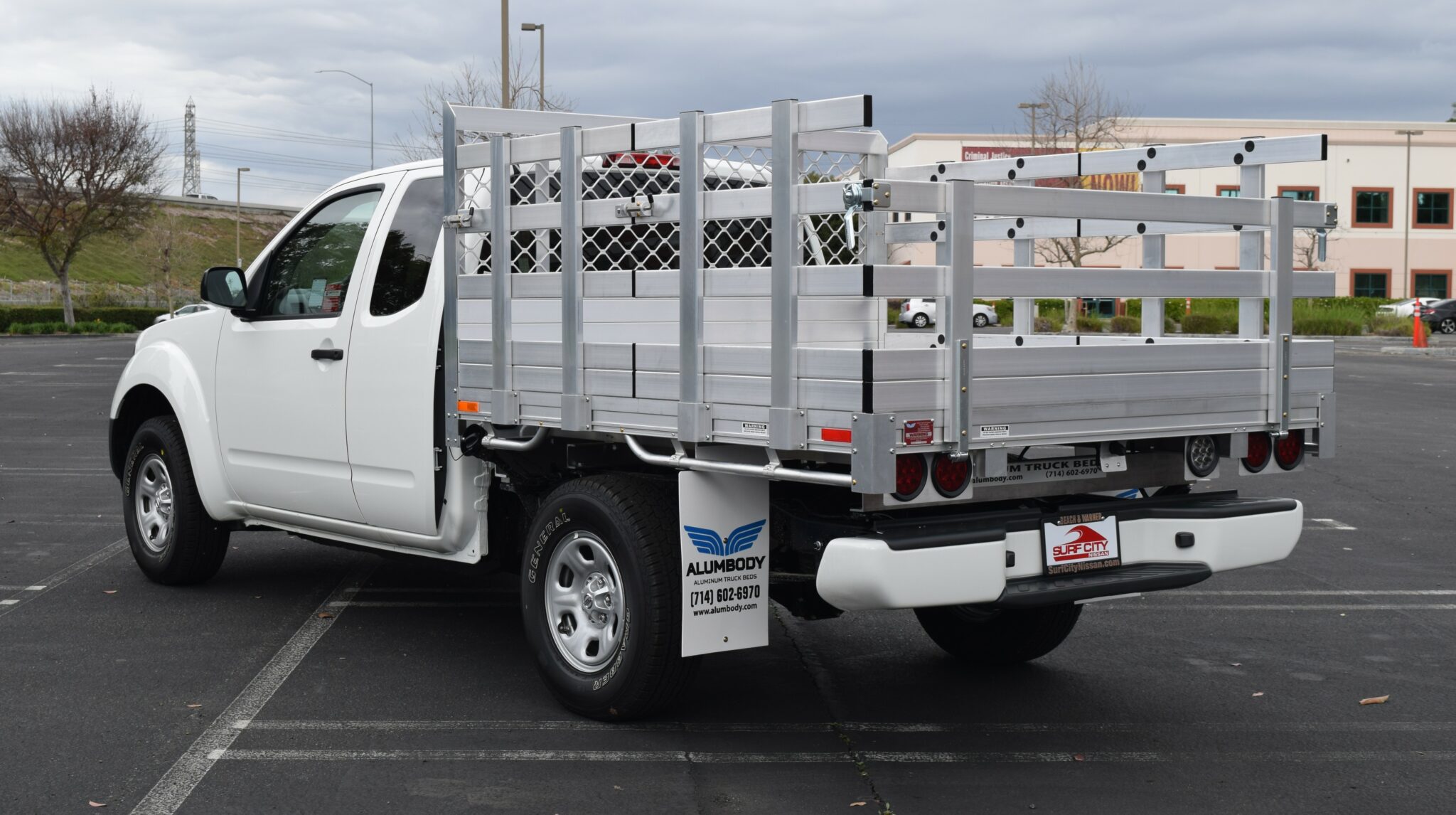 2019 Nissan Frontier 6'x6'6'', aluminum stake beds with 30'' lift out sides, 22'' fold down rear gate, using the factory bumper