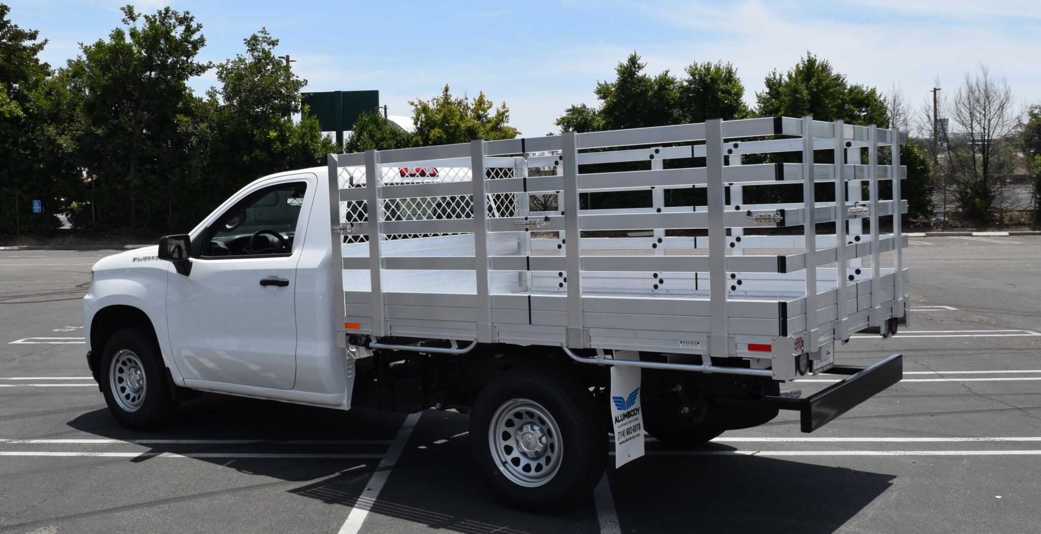 2019 Chevy Silverado 1500 66 X 9 aluminum stake bed with 38 lift out stakes using the factory bumper.