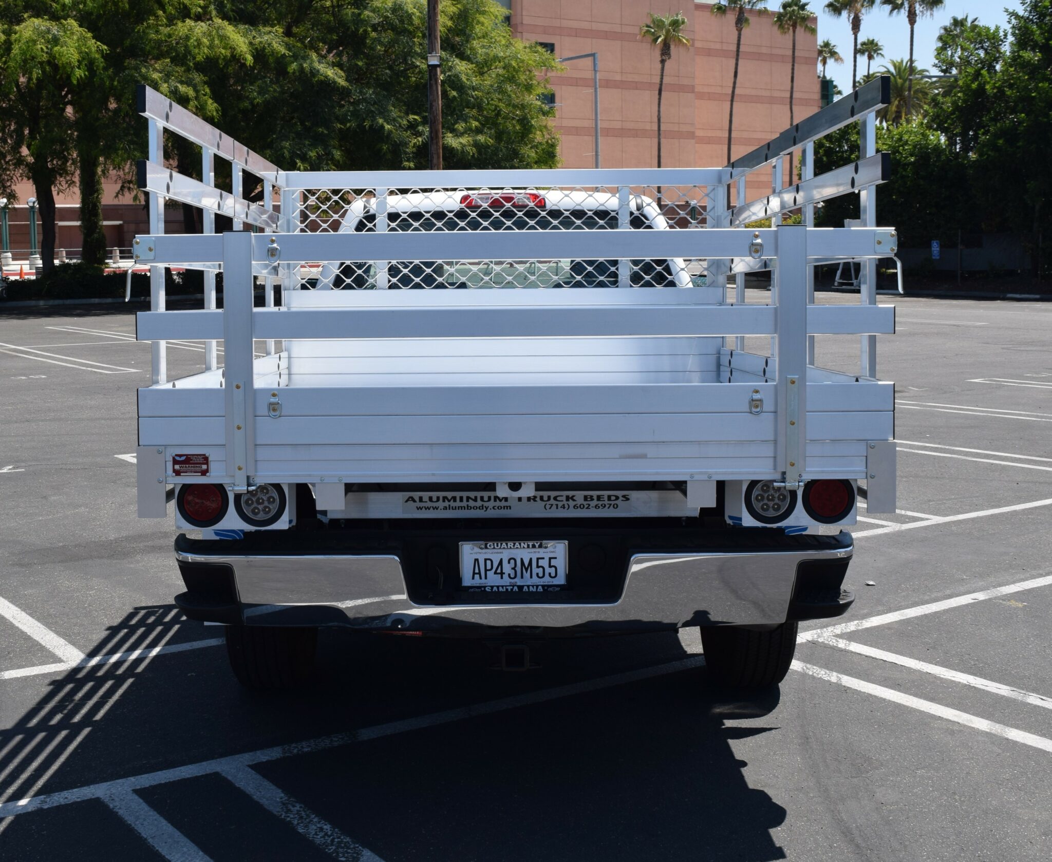 2018 Chevy Silverado 1500 66 X 9 aluminum stake bed with 38 lift out sides 22 rear fold down gates using the factory bumper