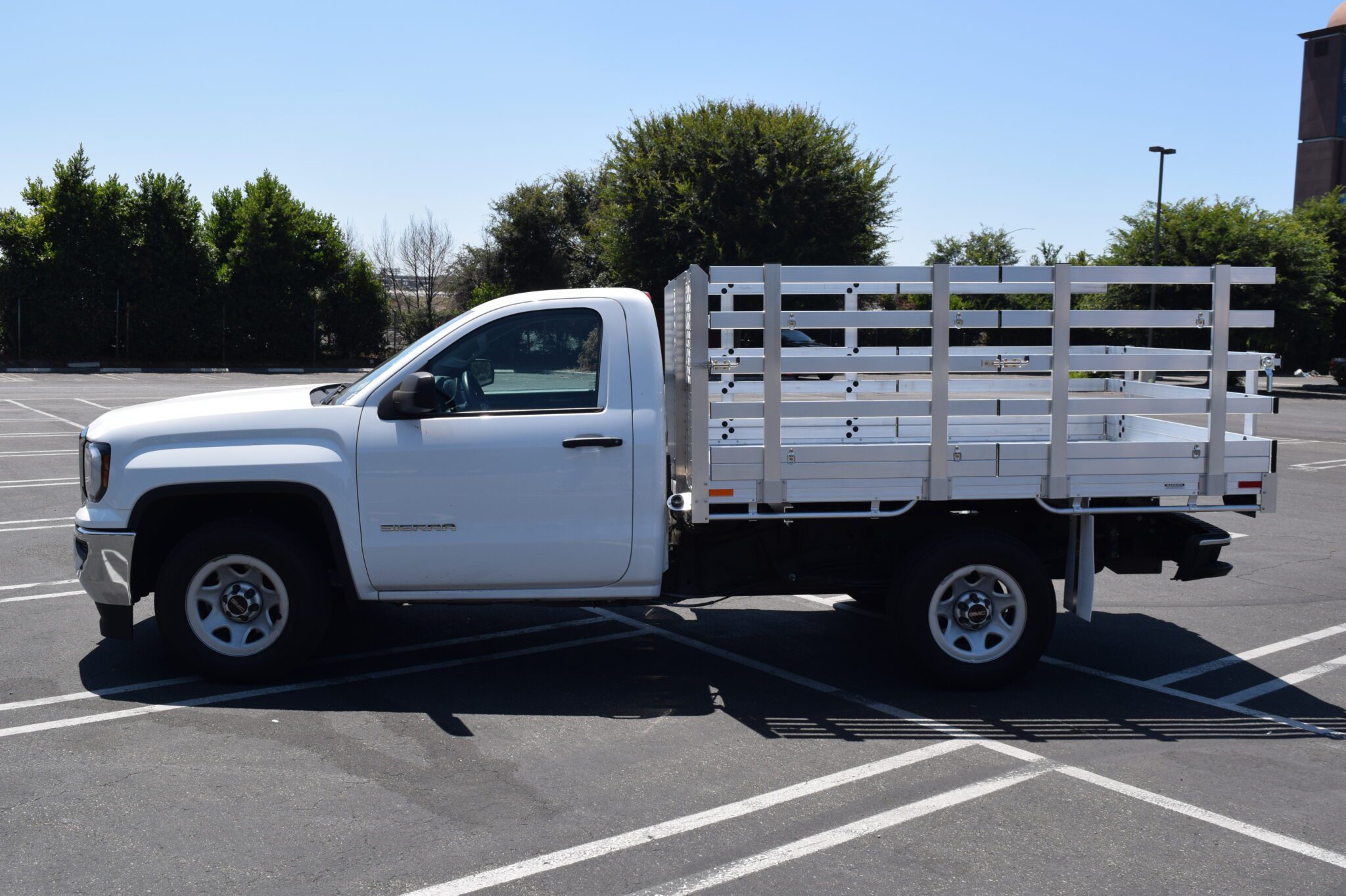 2018 GMC 1500, with a 6'6''X9' aluminum body, 38'' lift out side gates, 22'' fold down rear gates & D-Rings