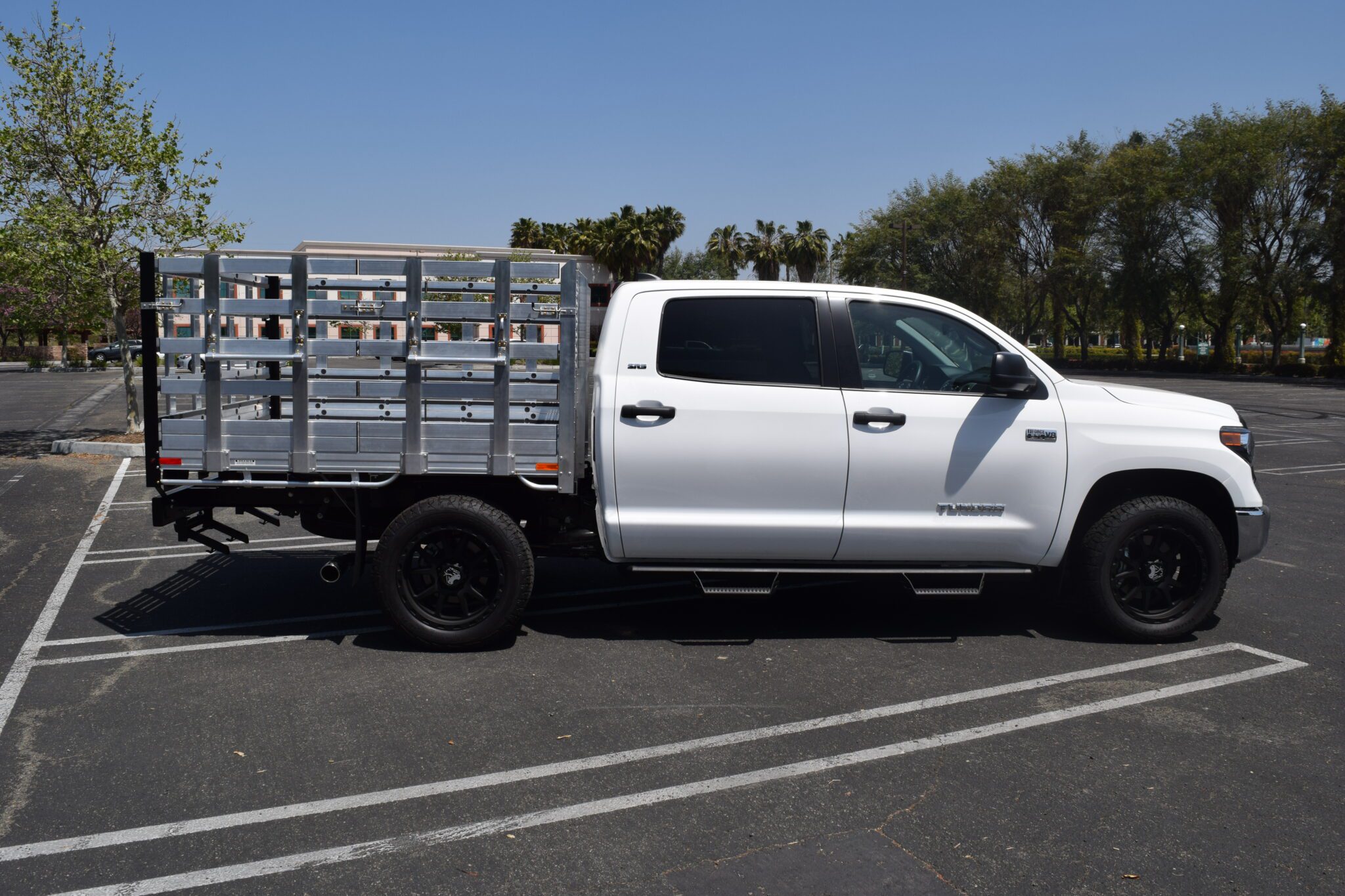 2007 Toyota Tundra with a 6'6" X 7' AlumBody aluminum stake bed, 38" lift-out stakes using the factory bumper