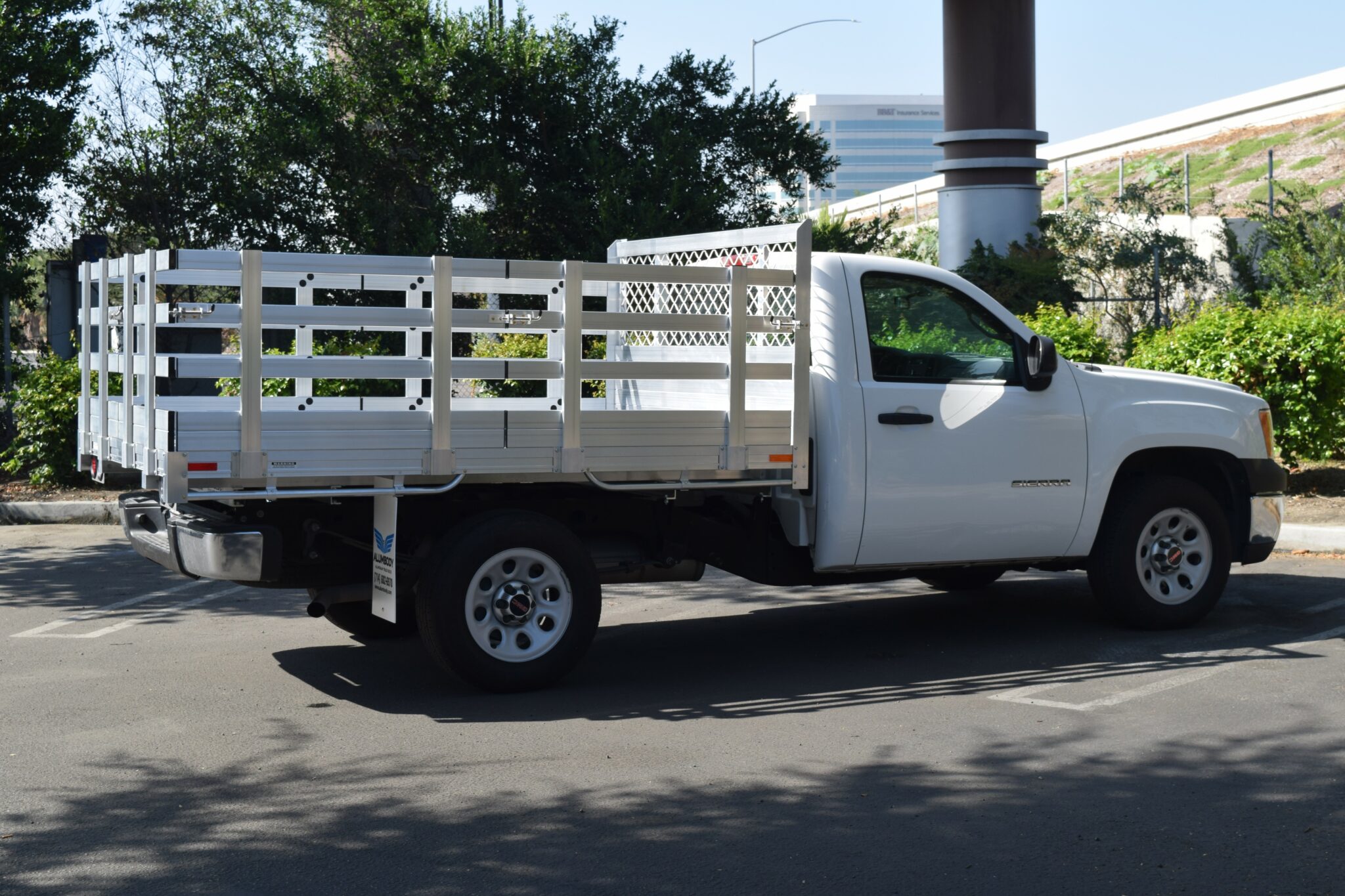 2012 Chevy Silverado 1500 66 X 9 Aluminum Stake Bed with 30 lift out stakes using the factory bumper