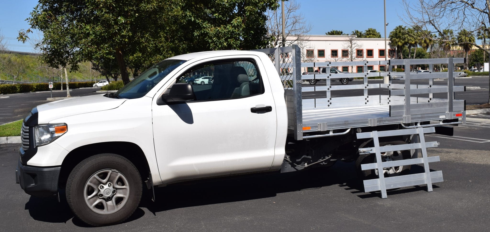 2017 Toyota Tacoma with a 6'X7' AlumBody stake bed with 33" lift-out gates and dock bumper