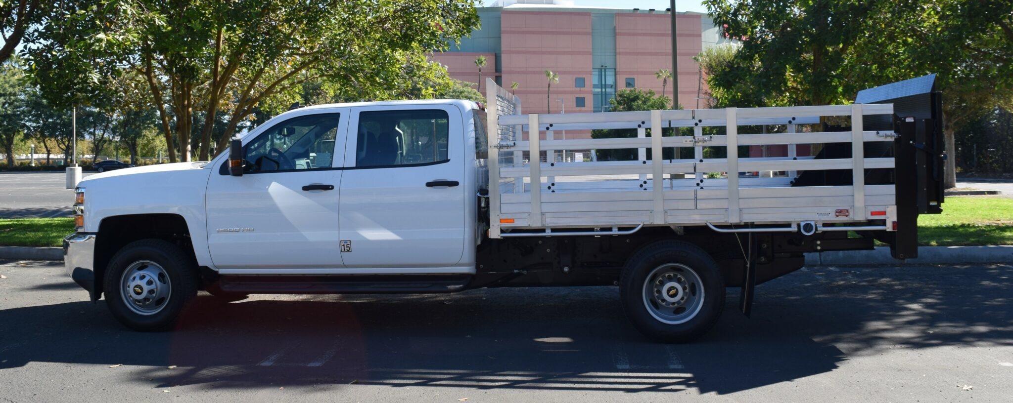 2019 Chevy Silverado 3500 76x10 aluminum stake bed with 30 lift out sides and lift gate in the rear