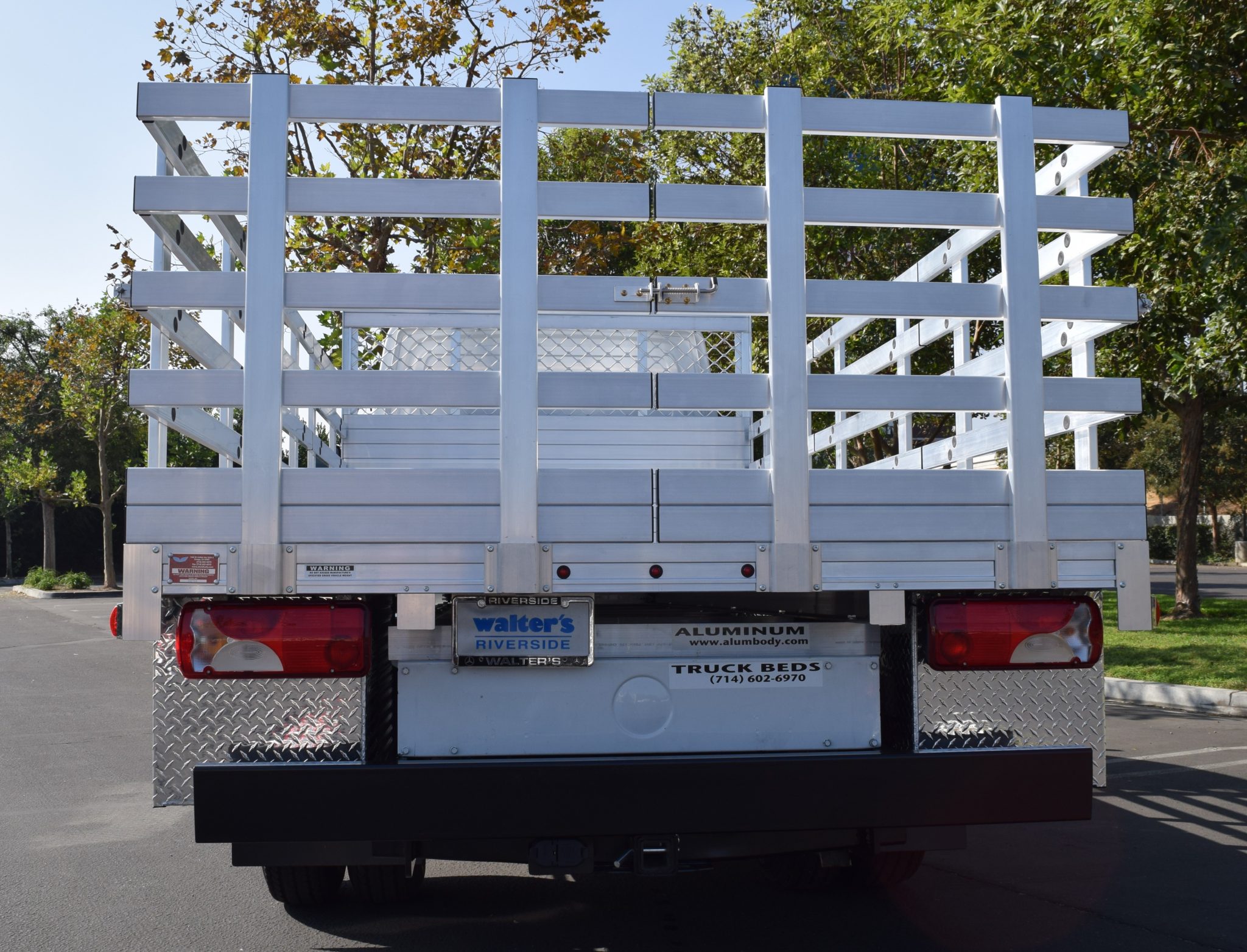 2016 Mercedes-Benz Sprinter 3500 Dual Rear Wheel with a 7' X 14' AlumBody aluminum stake bed with 38" lift out stakes, 4 underbody tool boxes 18" X 18" X 60" 18" X 18" X 36" and dock bumper