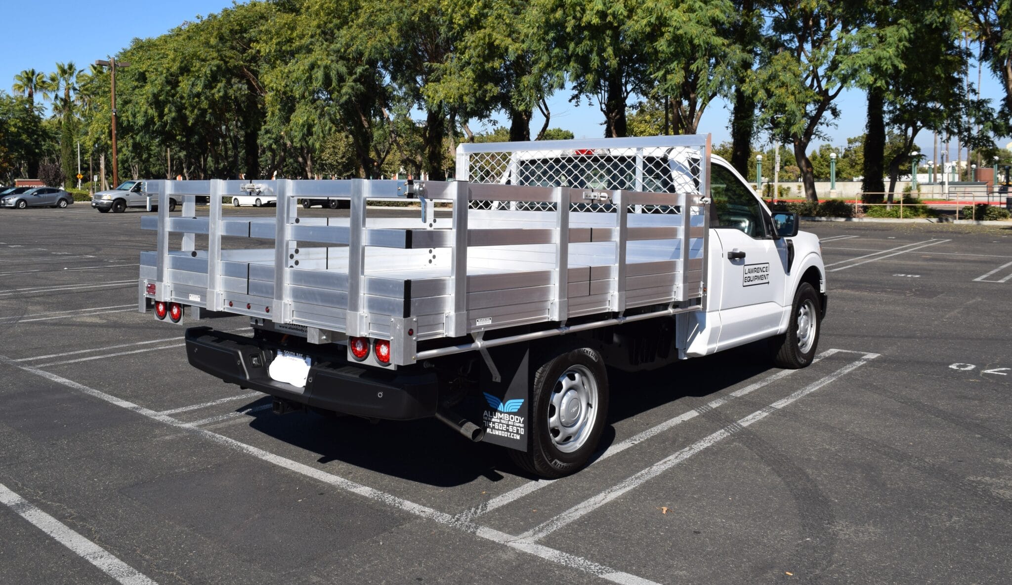 2021 F150 with a 7 x 9 Aluminum Bed with 22 Lift Out Stakes using the Factory Bumper 1