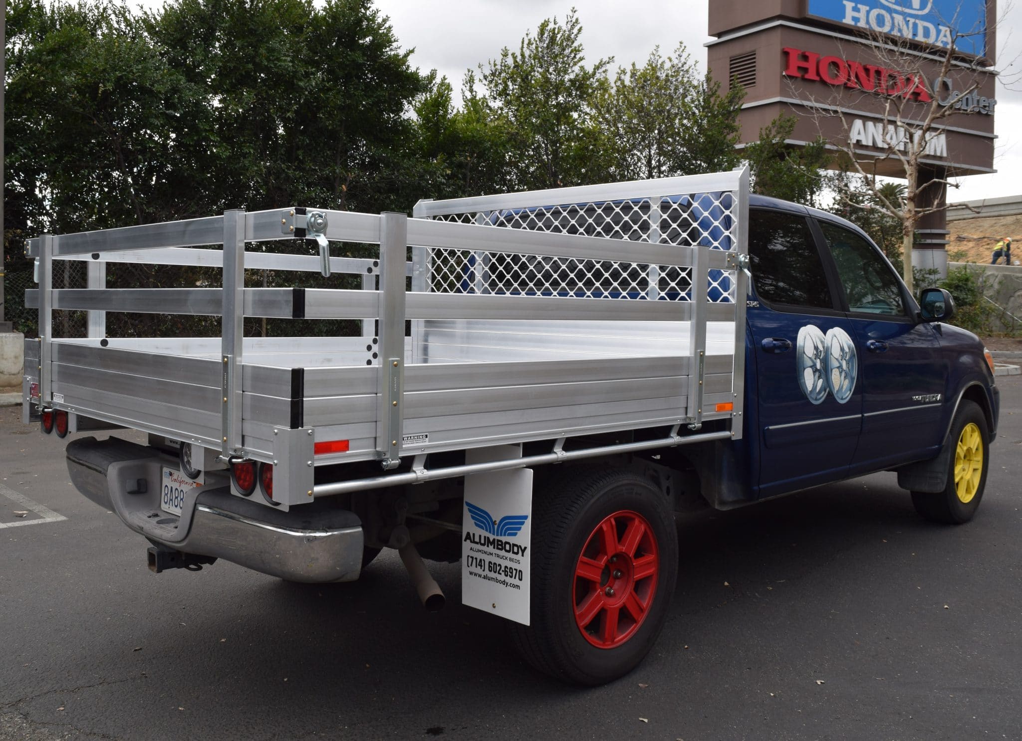 2006 Toyota Tacoma with a 6'X6'6" AlumBody stake bed, 22" lift-out gates using customer-supplied off-road bumper