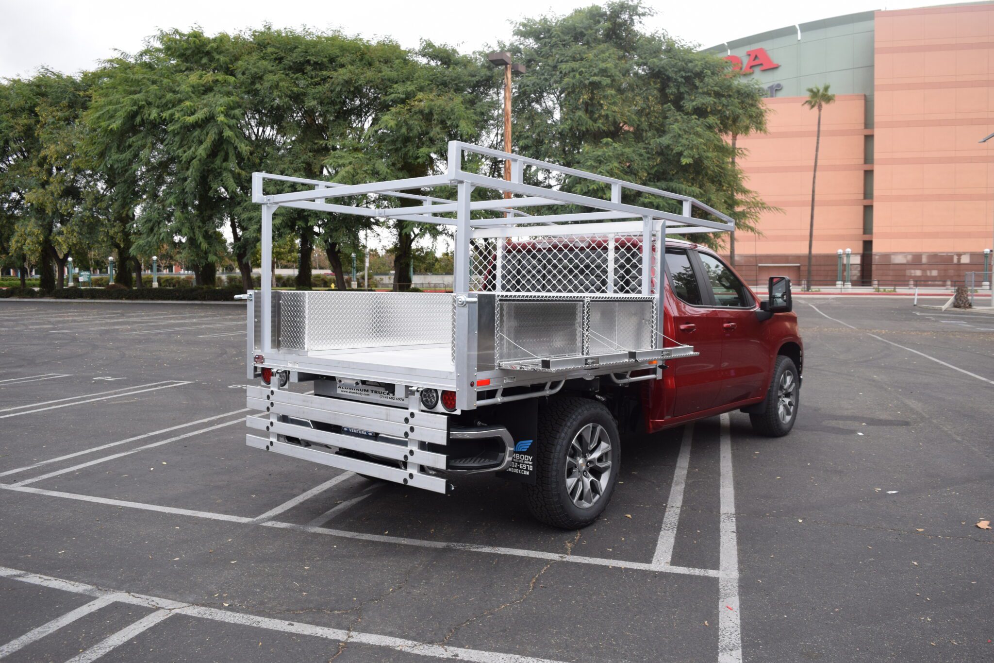 2021 Chevy Silverado 1500 66×7 aluminum stake bed with fold-down rear gate, 2 over-body toolboxes and rack