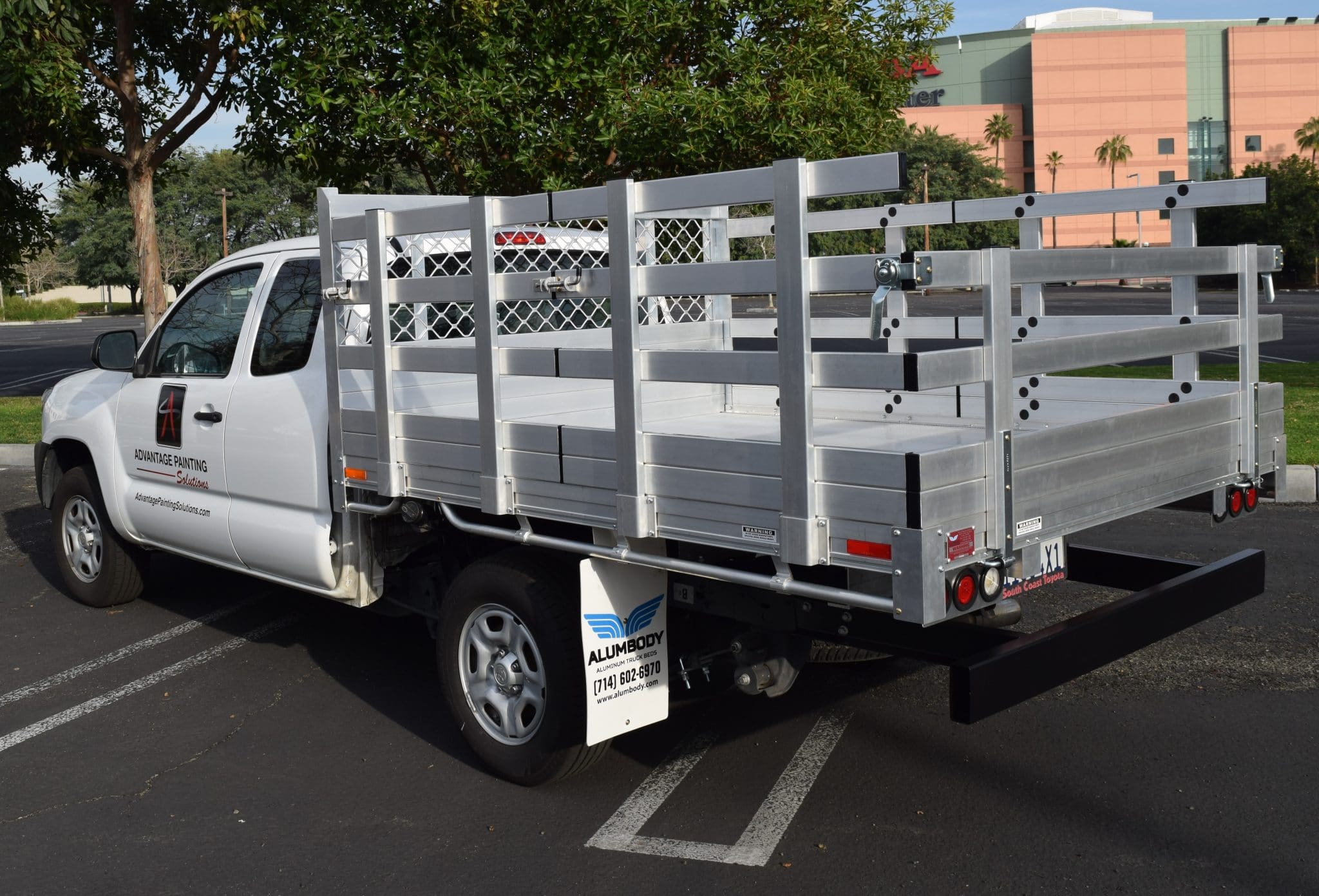2021 Toyota Tundra, 6'6" x 9' aluminum stake bed with 38" lift-out stakes, dock bumper, and hitch