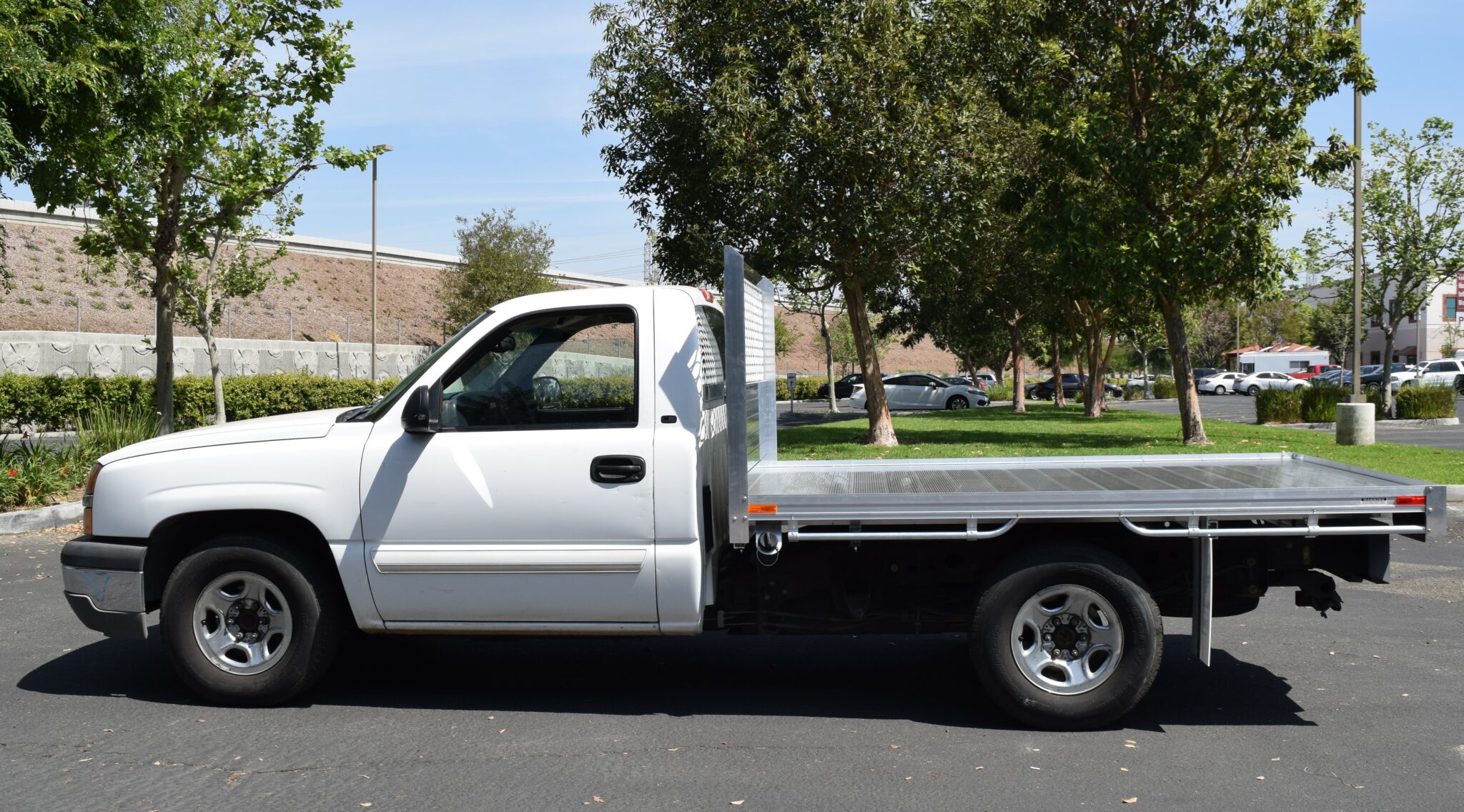 2003 Chevy 2500 66 X 9 Aluminum Flat Bed using the Factory Bumper.
