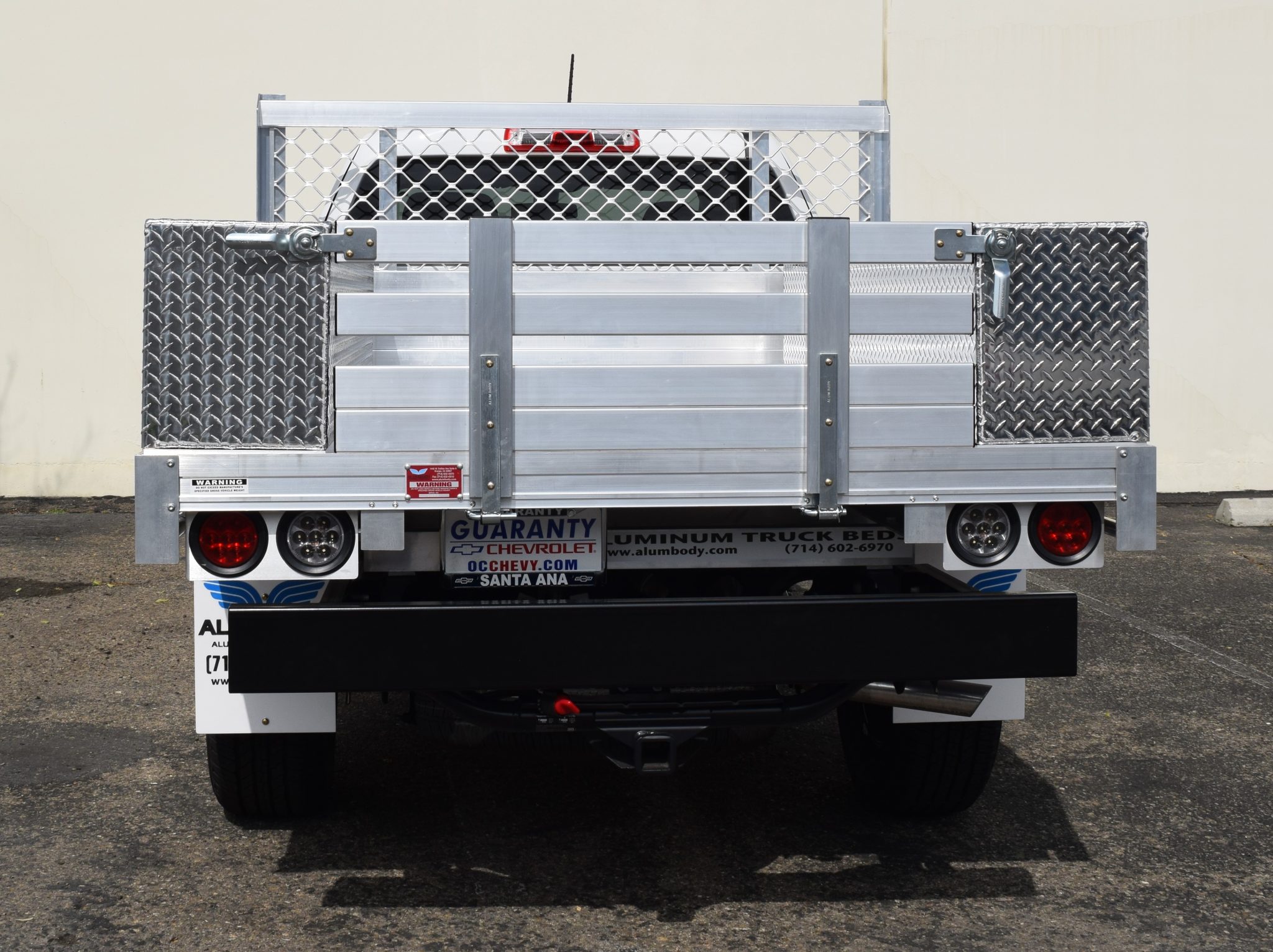 2017 Chevy Colorado with a 6' X 6'6" AlumBody aluminum flat bed 2 topsider tool boxes fold down rear gate and dock bumper