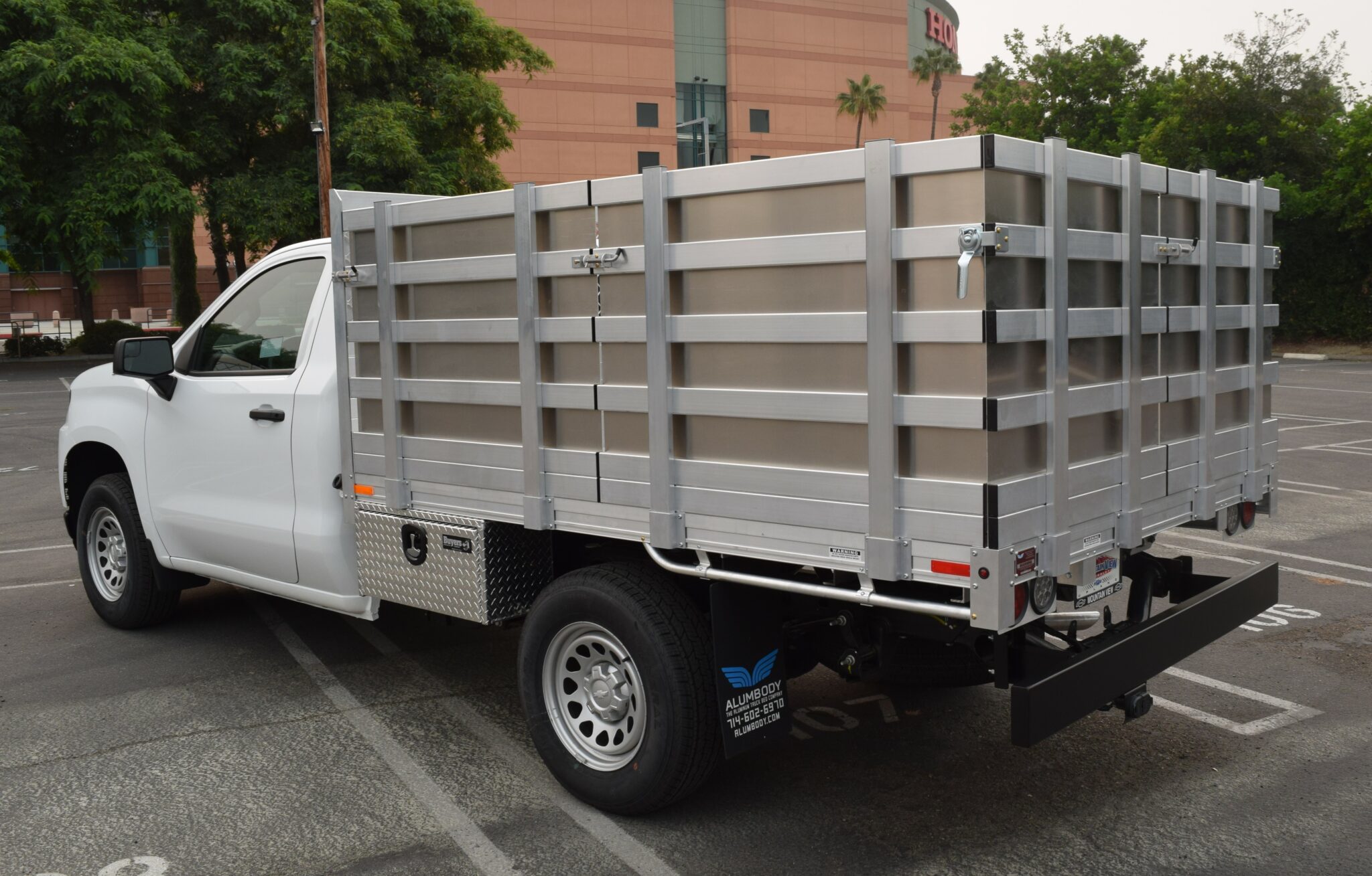 2020 Chevy Silverado 1500 66×9 aluminum stake bed with 38" lift-out stakes using aluminum sheet to create solid gates and dock bumper