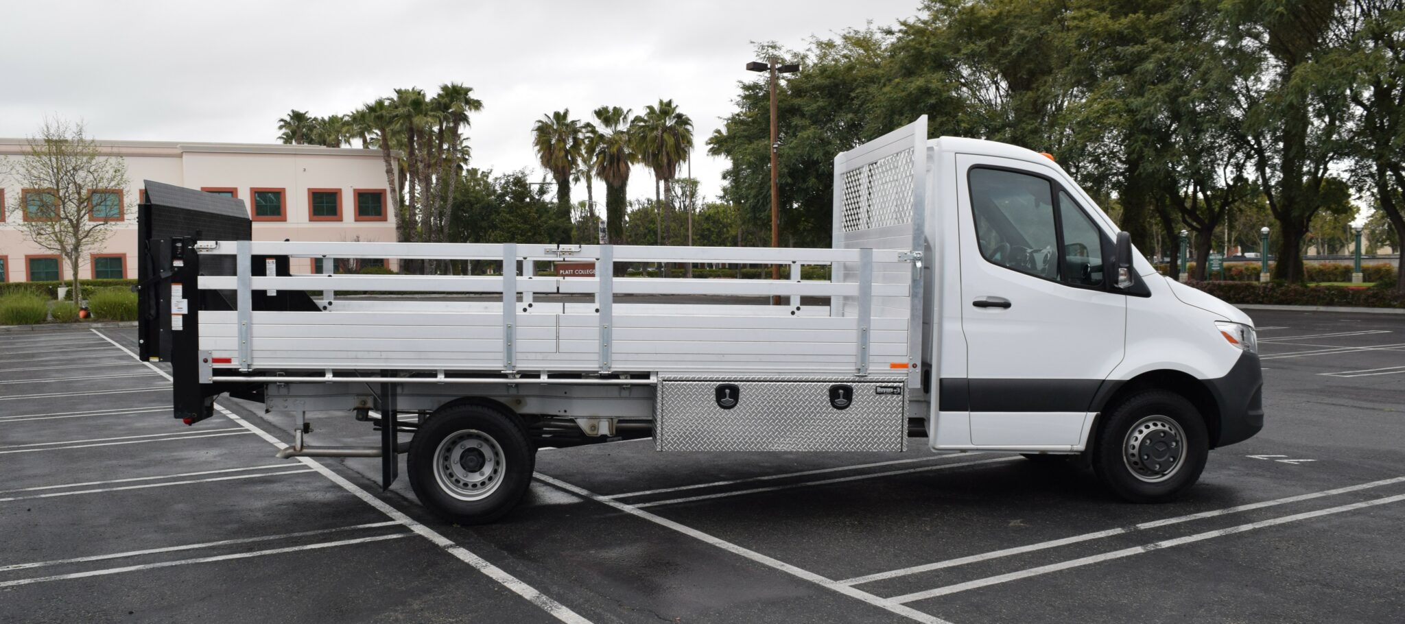 2019 Mercedes-Benz Sprinter 3500 7’6” X 14’ aluminum flat bed with 25″ fold-down sides, liftgate in the rear, and 2 tool boxes 18”x18”x60”