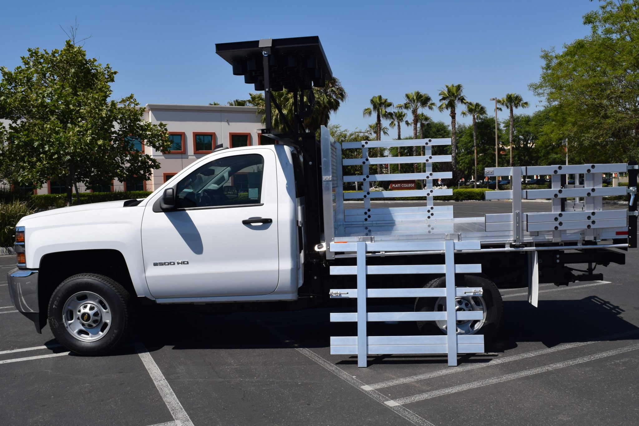2016 Chevy 2500 with AlumBody aluminum traffic control body with 38" lift-out stakes and 22" fold-down sides with 22" barn-door rear