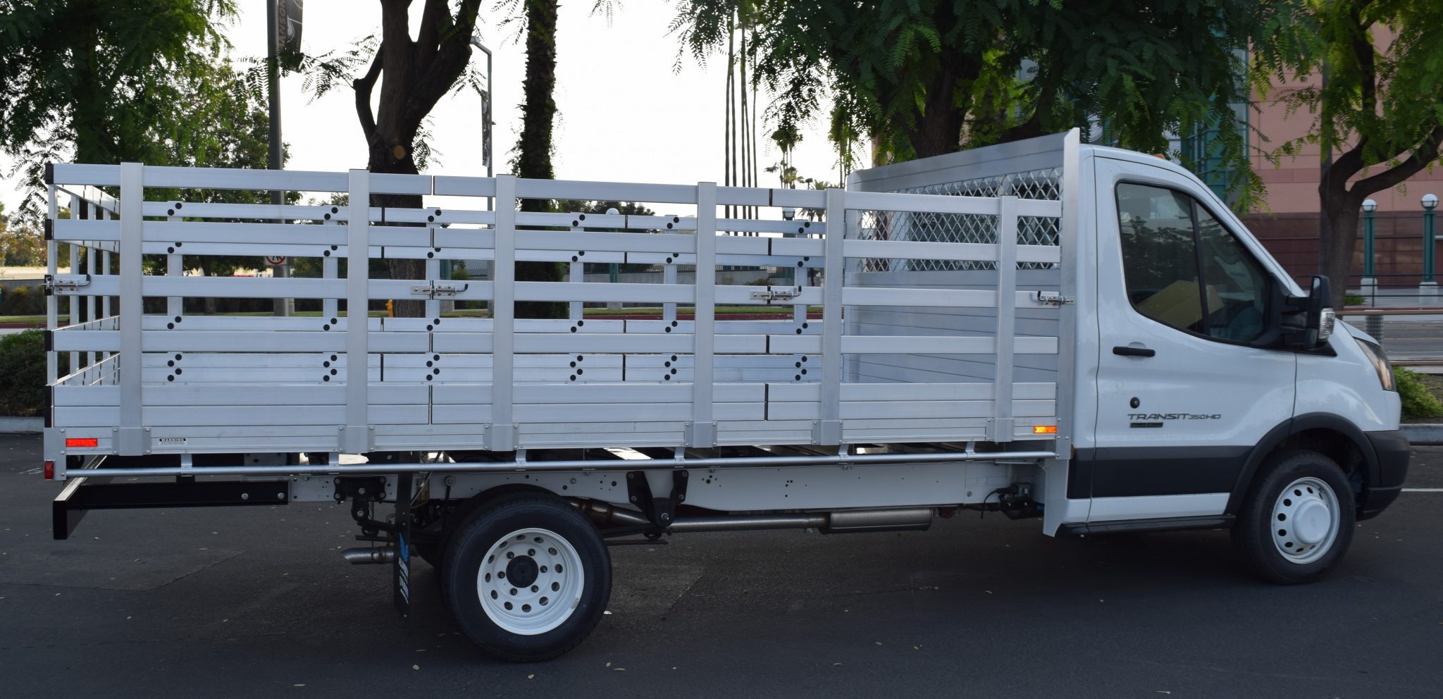 2017 Ford Transit 350HD Dual Rear Wheel 156" wheelbase with a 7'6" X 14' AlumBody aluminum stake bed with 38" lift out stakes and dock bumper