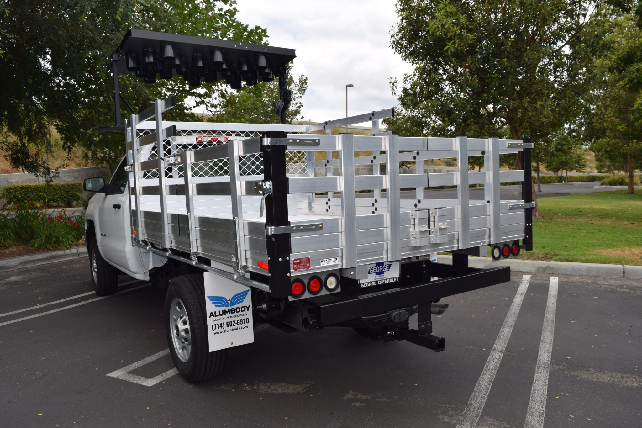2017 Chevy Silverado 2500 66X9 aluminum stake bed with 38 lift out front stakes 22 fold down rear side 22 rear barn doors light board wit bracket and dock bumper