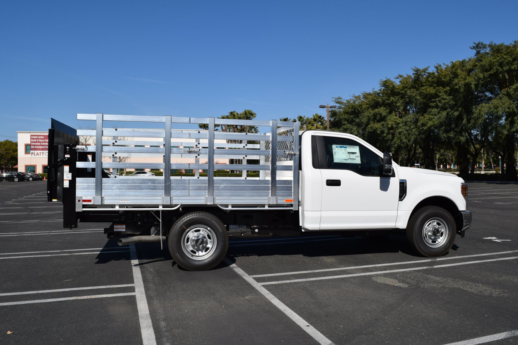 2019 Ford F250 66X96 aluminum stake bed with 41 lift out sides and lift gate in the rear