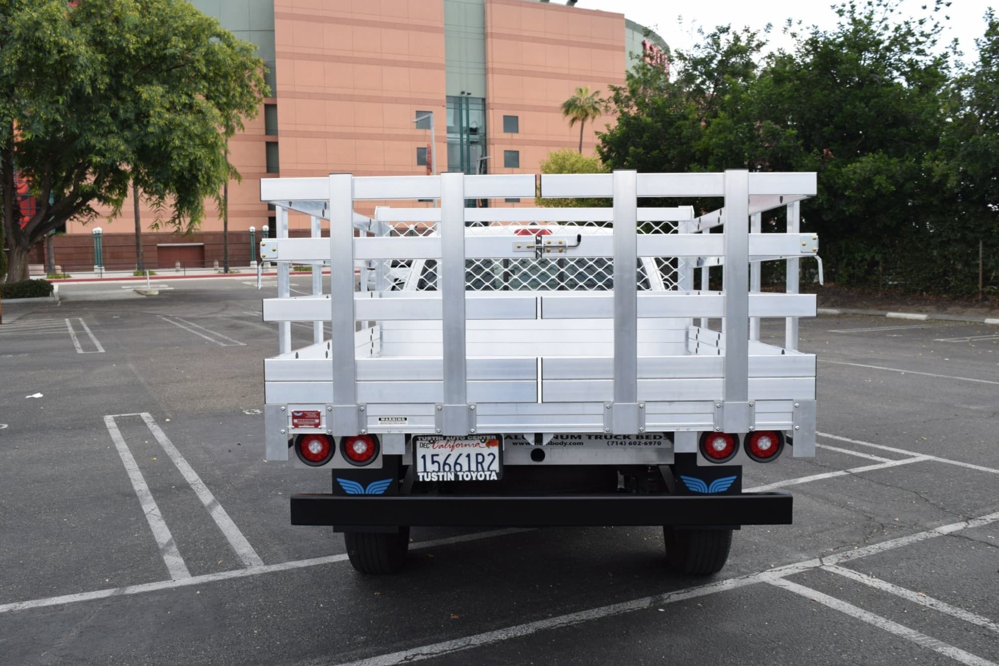 2021 Toyota Tundra, 6'6" x 8' aluminum stake bed with 38" lift-out sides, 38" barn doors in the rear, 2-step dock bumper, two gate-handle styles