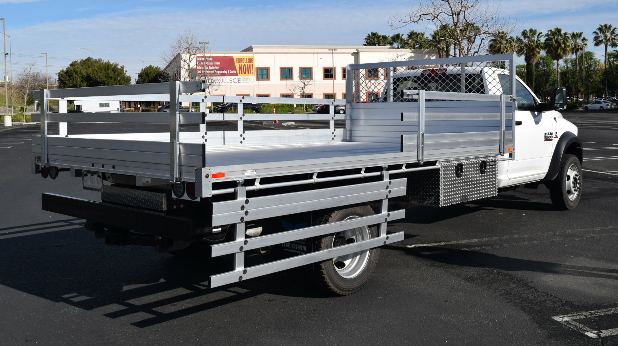 2018 Ram 5500, 8'x15' aluminum flatbed with 22'' fold down gates, underbody toolboxes 18''x24''x48'' and dock bumper
