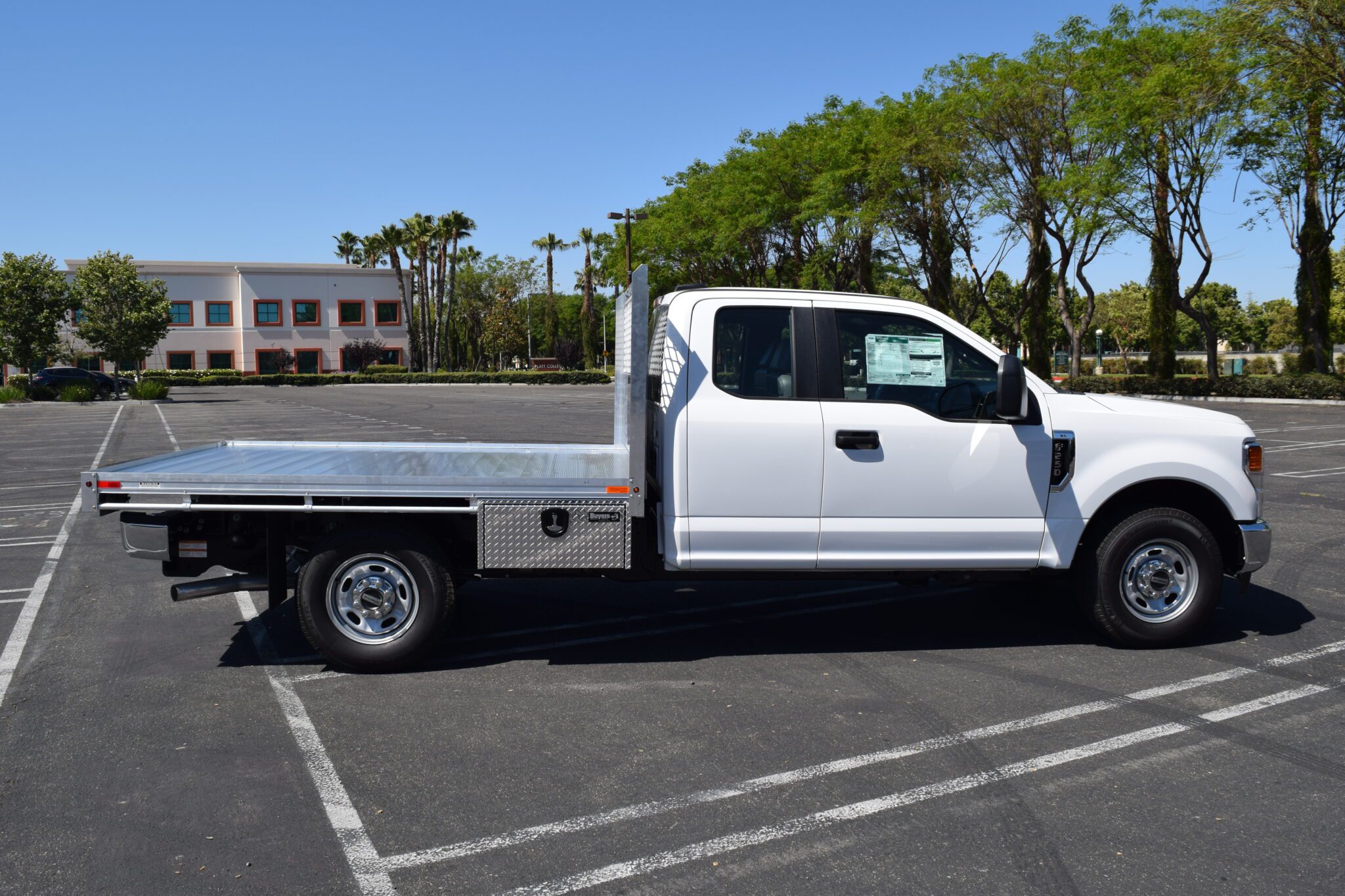 2021 Ford F250 7’ X 9’ aluminum flat bed (no stakes) with an underbody tool box 14”X12”X30” using the factory bumper
