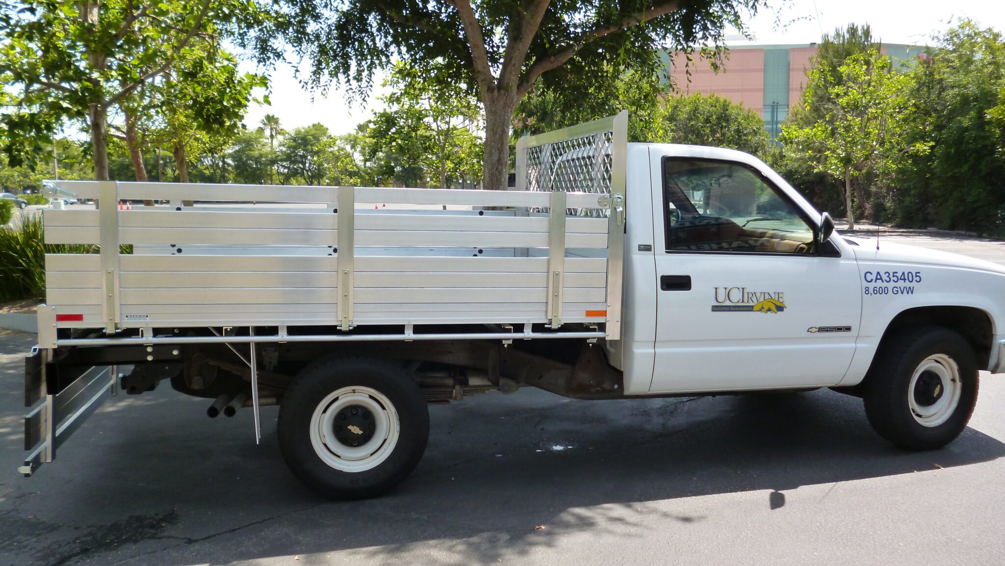 1991 Chevy Silverado 2500 66×9 aluminum flatbed with custom 22" fold-down gates and dock bumper