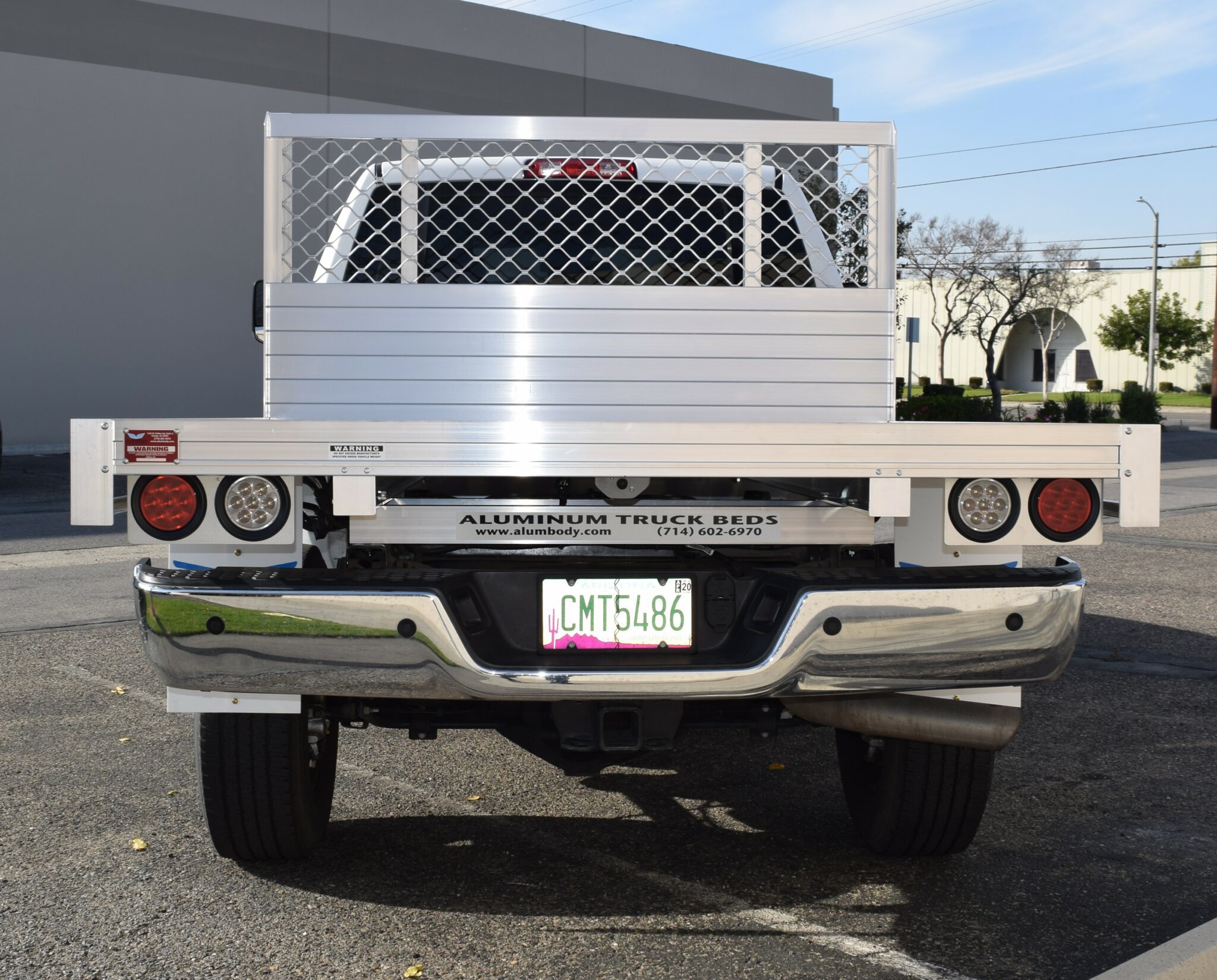 2017 Ram 2500, 6'6''x7' aluminum flatbed using the factory bumper