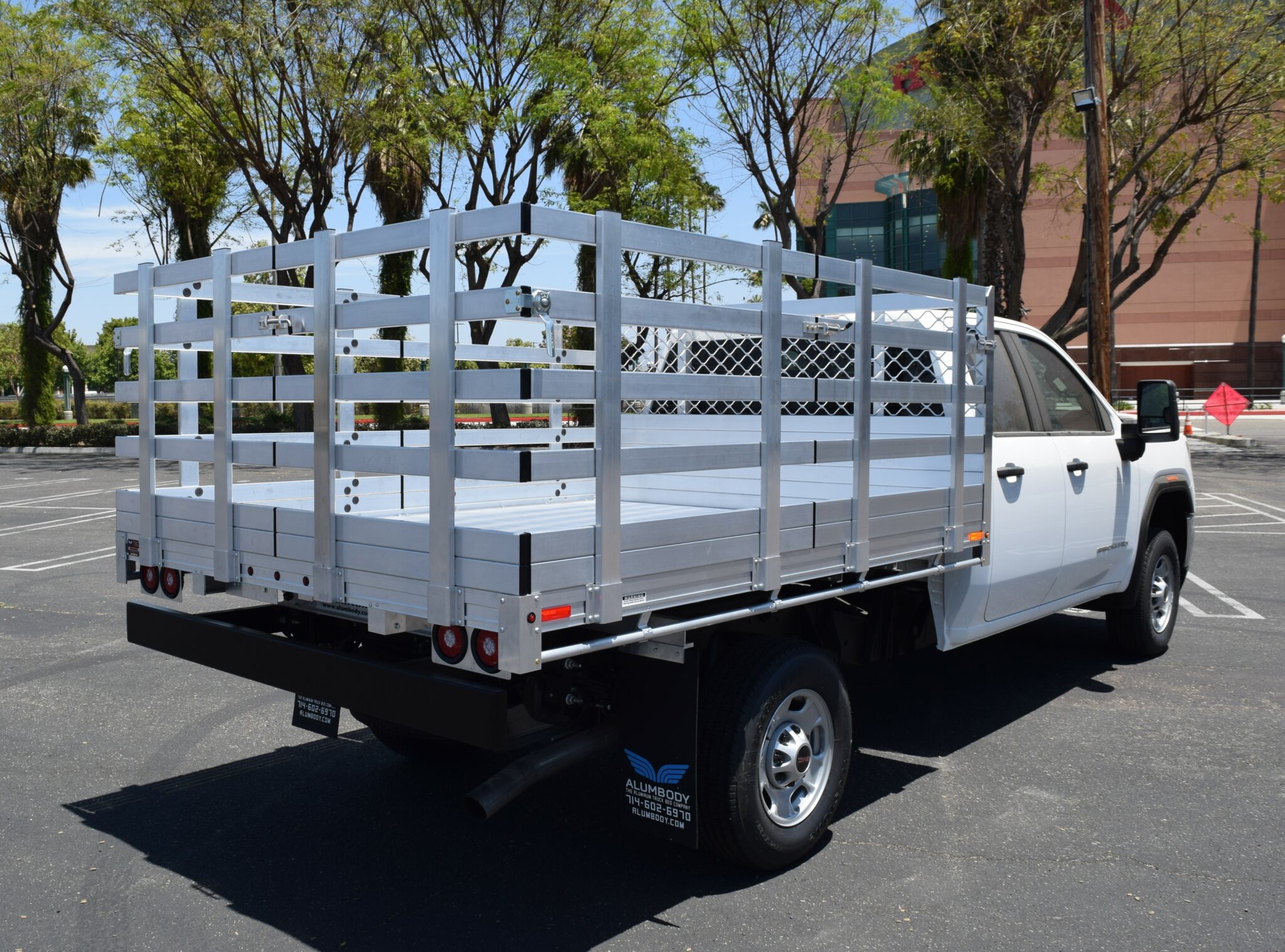 2018 GMC 2500, with a 7'x9' aluminum body, 30'' lift out sides and dock bumper
