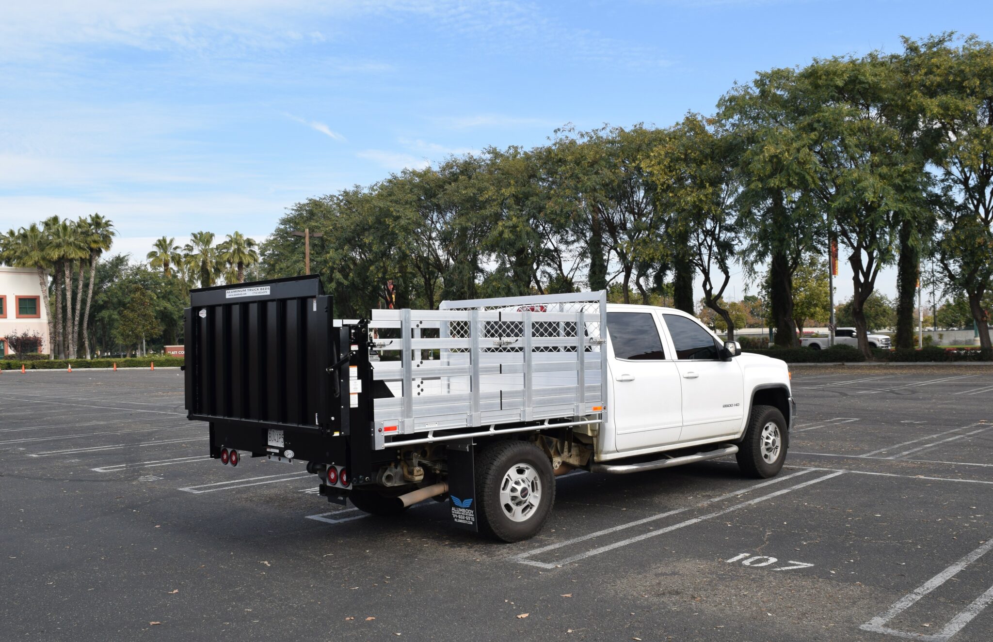 2018 GMC 2500 7'x8' aluminum stake bed with 30'' lift out sides and lift gate in the rear Passenger corner