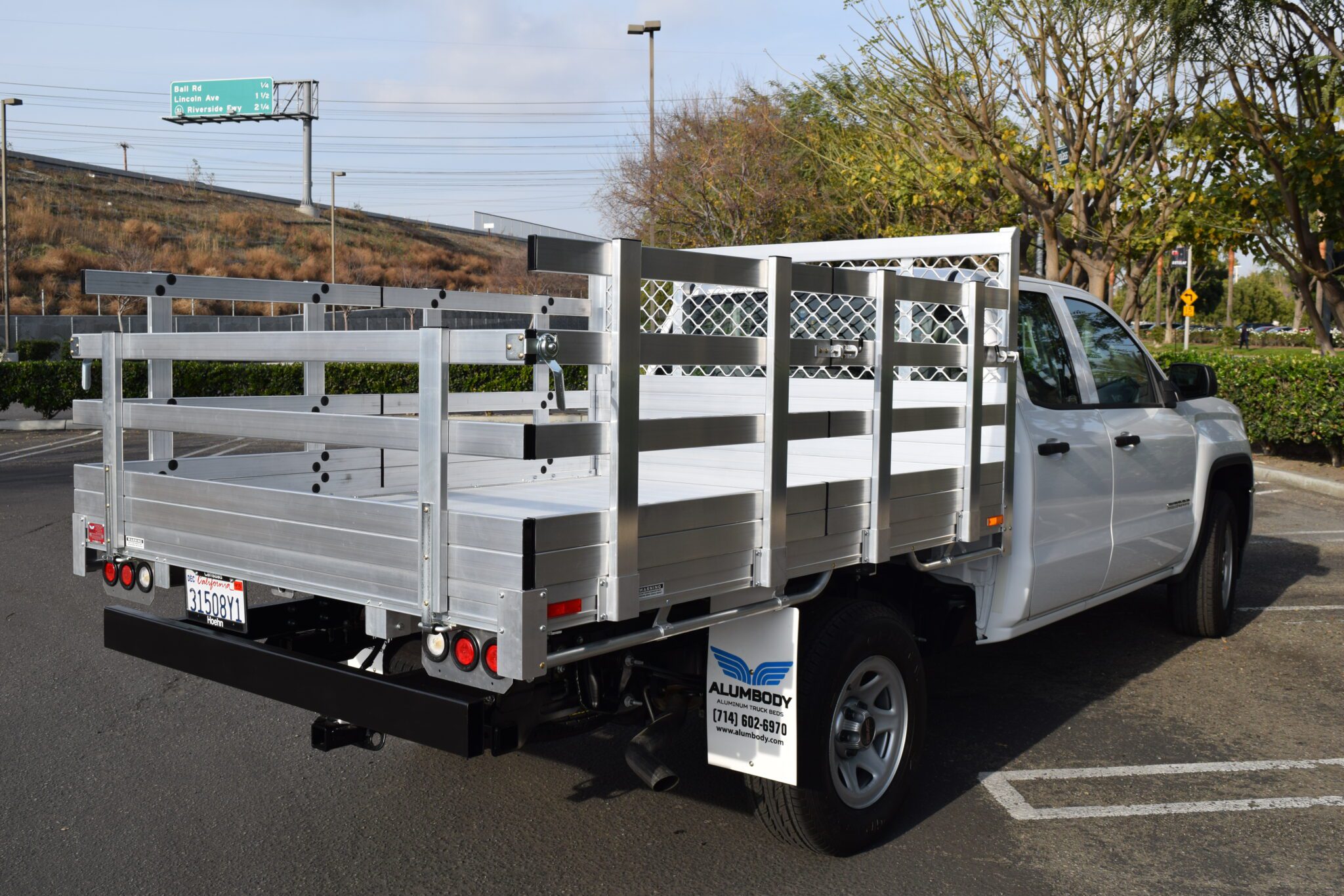 2016 GMC 1500 with a 6'6' X 9' aluminum bed, 30'' lift out sides, 22'' fold down rear and dock bumper