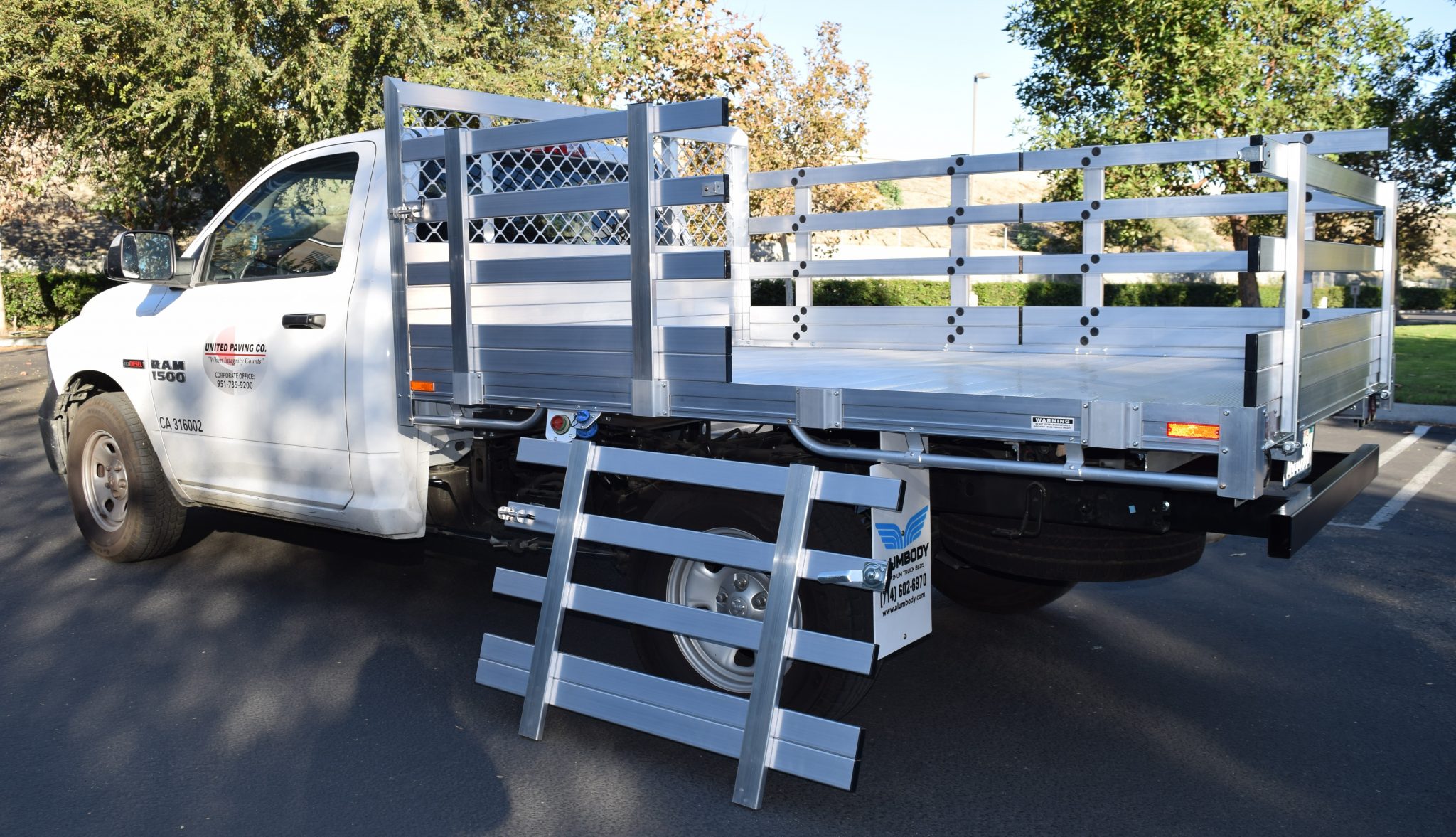 2017 Ram 1500 with a 6'6" X 9' AlumBody aluminum stake bed with 30" lift out stakes and dock bumper