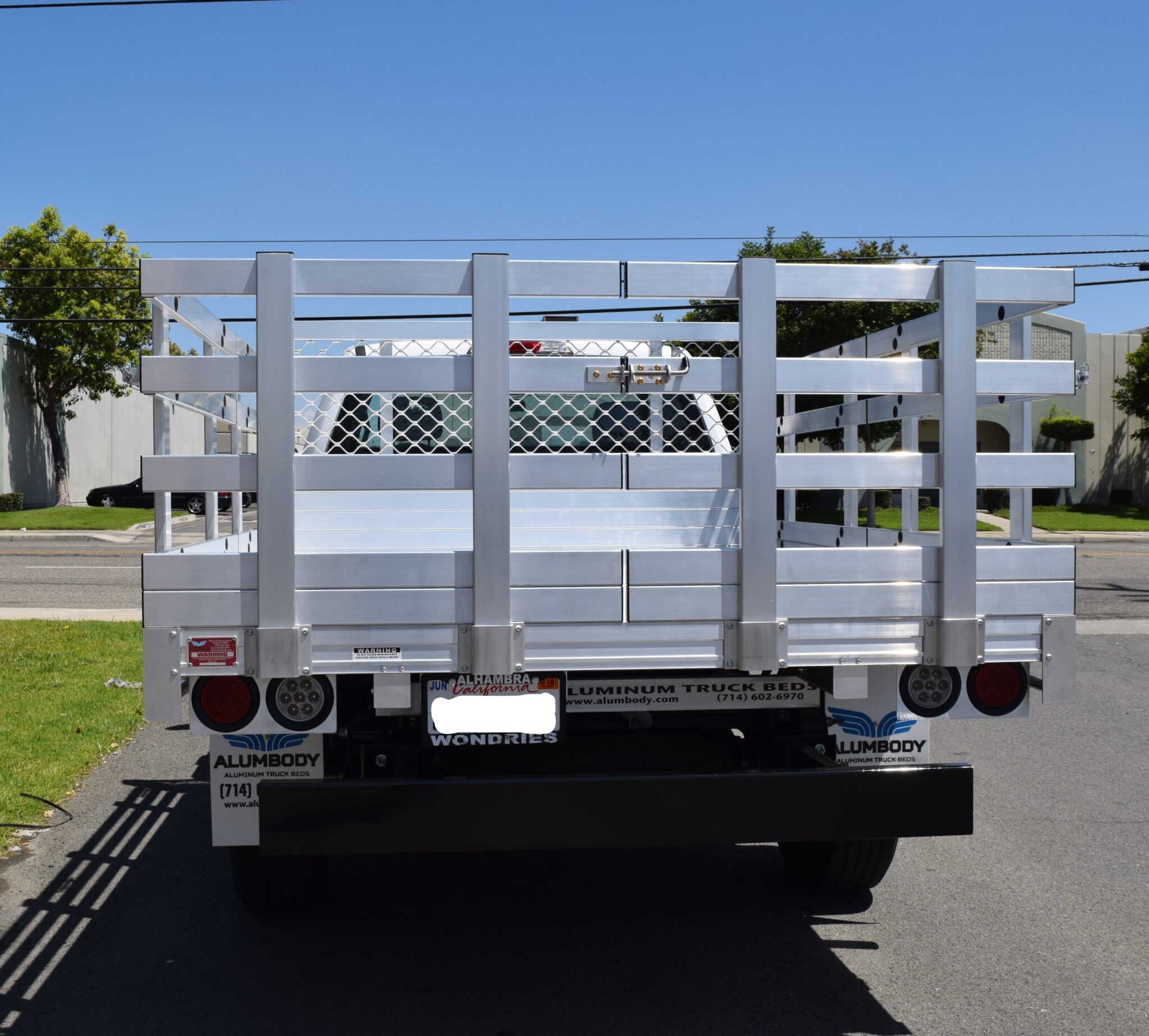 2017 Ford F150 66 X 9 Aluminum Flat Bed with 30 Lift Out Stakes and Dock Bumper.