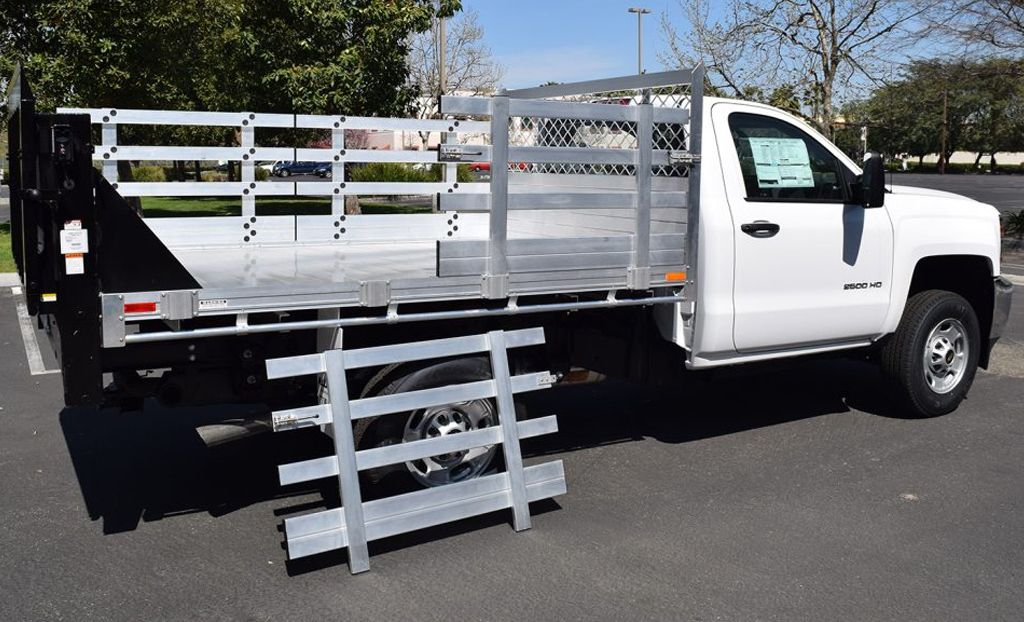 Service body truck bed with side compartments and tool storage