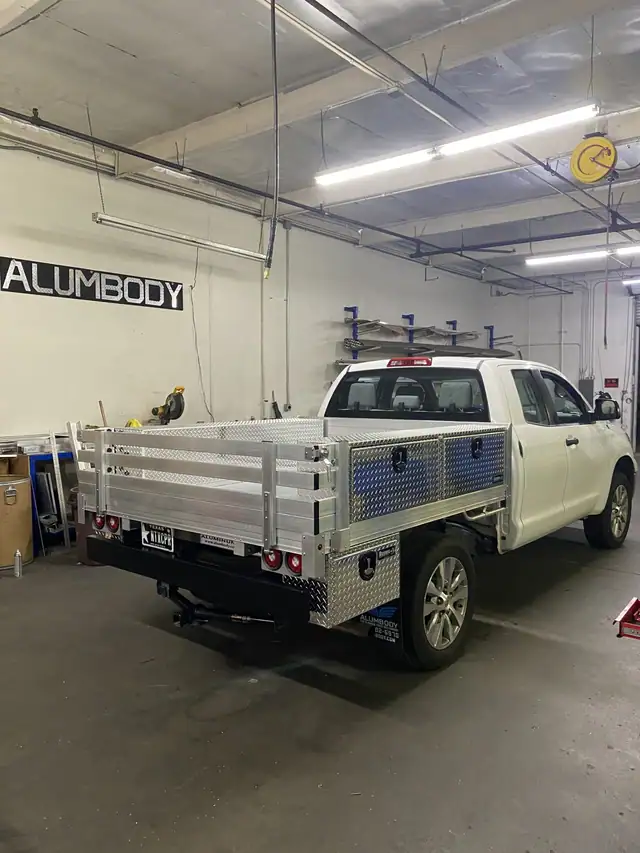 2008 Toyota Tundra 6’6” x 7’ aluminum bed with fold-down rear gate, 2 underbody tool boxes 14”X12”X30”, 2 over-body tool boxes 16”x13”x72”, dock bumper and hitch